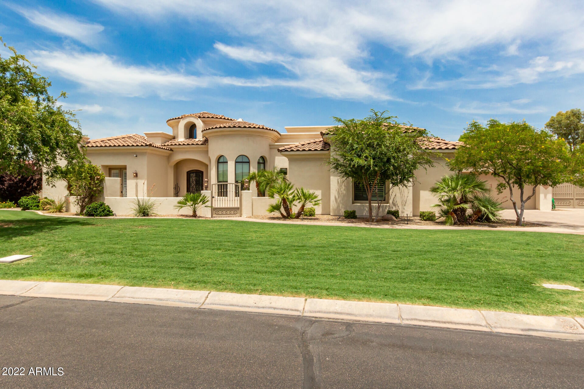 Welcome to the Beautiful Bela Flor Gated Custom Home Community!  Your tour begins with an impressive Cobblestone Entrance followed by Tree Lined Streets within this Quaint Community.  Wind your way to your 5 Bedroom, 4.5 Bath, 4601 sf Home built in 2013 by the renowned Picasso Homes.  Situated on a Cul-de-Sac with large Pavered Driveway, Custom RV Gate and 4 Car Garage with New Custom Cabinetry and vented AC.  Private Courtyard Entrance with Fireplace.  Unique Entry boasts Glass Wall for Panoramic view of Pool/Spa/Patio area.  Very functional floor plan includes a huge Bonus Room great for an extra area for kids playroom, teen-room or adults! All Bedrooms with Bathroom access and Walk-in Closets. Private Owner's Suite includes Luxurious Bathroom with large Walk-in Shower, Towel Warmer, Separate Vanity Areas, and deep Jetted Bathtub.  New Custom Designed Walk-in Closet by Classy Closets.  Gourmet Kitchen with Double Ovens, Built-in Refrigerator, Large Island, oversized Walk-in Pantry and Beautifully Designed Wet Bar.  The oversized Laundry Room has loads of storage/cabinetry with freezer that will convey. Huge Great Room with oversized Sliding Doors for Indoor/Outdoor Living. Outdoor Living features a Bulit-in BBQ area, Gas Firepit, Heated Pool/Spa all surrounded by an impressive, large Travertine Patio. Pool has removable fencing as well.  Very private with an extra layer of block added to fence.  New Shutters installed, new Hot Water Circulating Pump on Water Heater, and Freshly Painted inside and out in 2020. Electric Hook-up to Charge Car in Garage. This home will not disappoint!