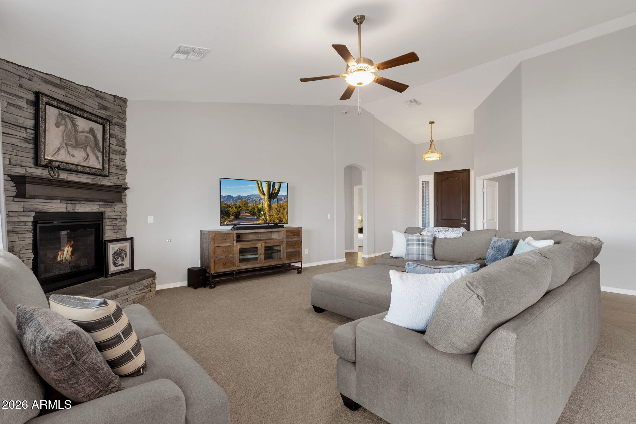 Welcome to a rare opportunity in a small, gated enclave of newer homes in San Tan Valley -- where space, privacy, and flexibility come together in a way that's hard to find.

Built in 2019, this 2,328 square foot home offers 4 bedrooms, 2 baths, and a highly sought-after 4-car garage -- plus an RV gate and dedicated RV parking. Whether you need room for vehicles, toys, a workshop, or extra storage, this property delivers.

Situated on an expansive 56,000 square foot lot (well over an acre), the possibilities here are truly exceptional. The lot is fully enclosed with a block wall for added privacy and security, and there's already a horse corral at the rear of the property -- perfect for equestrian enthusiasts or anyone wanting space to spread out. Inside, the home features a modern, open layout built for comfortable living and easy entertaining. The split floor plan offers privacy, while the generous living spaces create a welcoming environment for gatherings or quiet evenings at home.

The backyard is currently a blank canvas -- giving you the freedom to design exactly what you want. Dreaming of a resort-style pool? Detached guest house? RV garage? Outdoor arena? Lush landscaping? With this much land, you don't have to choose -- you can create it.

Homes in gated communities with this lot size, garage capacity, and flexibility rarely come to market. If you've been waiting for space without sacrificing newer construction, this is the one you need to see.