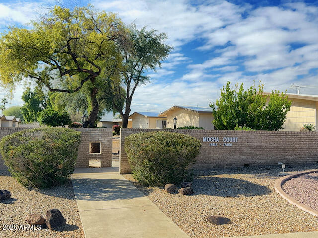 This inviting one-bedroom, one-bath patio home offers a spacious, well-designed interior with comfortable living areas. An Arizona room opens to a private rear patio, perfect for relaxing or entertaining, while the front patio overlooks a beautifully maintained common area. The large bedroom easily accommodates a desk or workspace. An attached garage includes ample storage cabinets, plus a washer, dryer, and laundry sink for added convenience. Ideally located near shopping, dining, recreation centers, and swimming, this charming patio home is ready to become your special place to call home.