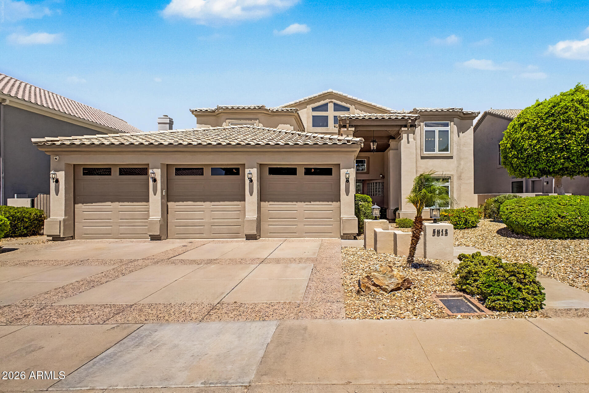 Experience luxury waterfront living in the exclusive community of Del Lago Circle. Ideally located just north of Loop 101, it offers convenient access to I-17, premier shopping, dining, entertainment, and is in close proximity to the expanding TSMC development. This spectacular remodeled custom home is priced at current appraised value and offers an exceptional opportunity in one of the area's most desirable locations. This elegant waterfront residence blends timeless architecture with extensive modern upgrades including Low-E energy lighting and extensive recessed LED lighting. A scenic lakefront entry welcomes you into a private, relaxing setting with breathtaking lake and mountain views. The thoughtfully designed floorplan offers exceptional flexibility with dual primary suites--one on the main level and an expansive upstairs retreat--connected by a dramatic custom wrought iron staircase and catwalk overlooking the grand living spaces below. Upstairs, two oversized guest bedrooms share a Jack & Jill bath; one bedroom features a private balcony and walk-in closet. The extensively updated kitchen showcases granite countertops, a full tile backsplash, wall-to-wall custom cabinetry, a buffet bar with additional storage, a GE Monogram 48 in. Built-In Side-by-Side Refrigerator, and spacious eat-in counter seating. The remodeled laundry room offers abundant cabinetry, granite countertops, tile backsplash, and a deep soaking sink. Additional upgrades include remodeled bathrooms, refinished cabinetry throughout with updated hardware and soft-close hinges, elegant updated lighting, and fresh interior paint. The luxurious upstairs primary retreat features dual walk-in closets with custom built-ins, a private balcony, a spa-inspired bath with a freestanding soaking tub, a walk-in rain shower, and a private water closet. Additional features include: Pella doors and windows throughout, a great room with soaring cathedral ceilings, a wet bar in the formal living room, two wood-burning fireplaces, a formal dining room, a private den/TV room, tile, carpet, and wood flooring, a cedar-lined linen closet, a central vacuum system, an extended-height 3-car garage, a relaxing inground spa, North/South exposure, and two covered walk-out patios overlooking the lake. Extensive 2026 updates include: a refinished custom wrought iron staircase, an elegant crystal foyer chandelier, new recessed LED lighting throughout, refinished cabinetry throughout the home, updated hardware and soft-close hinges, new carpet and baseboards downstairs, updated ceiling fans and vanity lighting, refreshed spa edge paint, and an updated drip irrigation system and irrigation lines. This rare waterfront opportunity combines luxury, privacy, location, and extensive upgrades in one exceptional property. Don't miss your opportunity to own this stunning custom home in Del Lago Circle