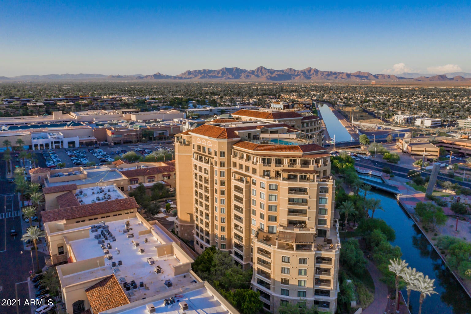 Beautiful 3 bedroom 3.5 bath at Scottsdale Waterfront Residences. New carpet, fresh paint, this unit is move in ready! Wonderful floorplan including formal entrance leading to a large great room, balcony and 3 split bedrooms. Granite and travertine throughout, Viking appliances, electrical upgrade package, custom blinds, and designer paint are all included. This elegant community offers 24 hour security, full time concierge, valet service, fitness center, roof top pool and spa, club room, BBQ at pool and club room, private wine lockers, 2 parking spaces in garage and large storage unit. Enjoy this spectacular location- walk to world class shopping, restaurants, and art district. Experience the excitement of Downtown!