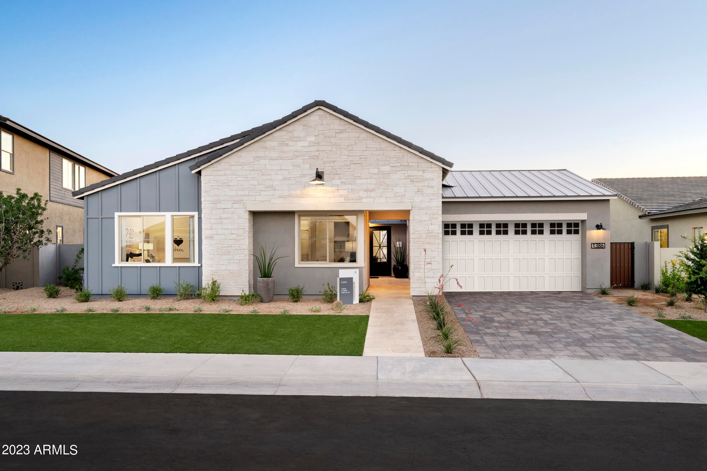 Farmhouse single-story model home located in Whimbrel at Waterston North. In addition to the endless amenities this community offers such as gated access and a clubhouse, this lovely home offers a private landscaped backyard with a pool and extended covered back patio. The interior of the home features 4 bedrooms, 3.5 bathrooms, and game room with sliding glass doors to the private courtyard. The kitchen boasts a GE executive gas appliance package and refrigerator, an alternate kitchen island, stacked cabinets, and quartz countertops that can also be found in the bathrooms. Other designer features include Sonoma Painted Linen cabinetry, a corner slider with post, decorator paint, window treatments, and a frameless walk-in shower with a rain can shower head. Washer and dryer included.