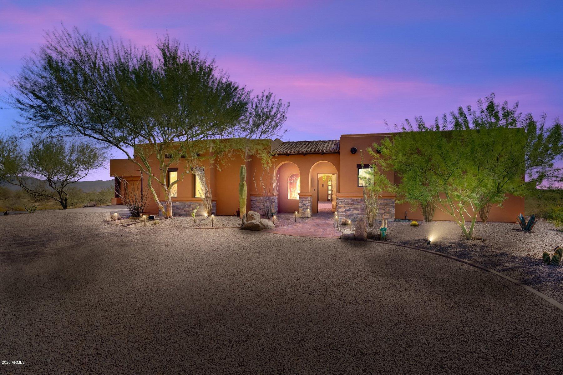 CUSTOM & CHARMING HACIENDA INSPIRED HOME FEATURES GATED PRIVATE CENTER COURTYARD. EACH RM HAS 8'' CUSTOM TRIPLE FRENCH DOORS TO COURTYARD. HUGE OVER-SIZED KITCHEN W/VIKING DOUBLE OVENS, DISHWATER, CENTER WORK ISLAND, DACOR 45'' GAS COOKTOP, LG CENTER ISLAND, BREAKFAST BAR. KIVA FIREPLACE IN BREAKFAST RM W/12' SLIDING ENTRY. GREATROOM FLOOR PLAN FEATURES HIGH WOOD BEAM CEILING, WOOD CEILING ACCENTS, WINE CELLAR W/CUSTOM STEEL DOOR. MAIN HS HAS MASTER SUITE & TWO MORE ENSUITES PLUS OFFICE/DEN. SEP GUEST HOUSE W/KING BDRM, LIVING RM, KITCHEN, BATH/SHOWER. FOUR CAR GARAGES W/EPOXY FLOORS, CABINETS, 400 AMP SERVICE. SHASTA DIVING POOL/SPA, IN-FLOOR CLEANING, LAP LANE & BENCH, MULTIPLE WATER FEATURES. BUILT-IN BBQ W/BAR, FIREPIT, OUTDOOR KIVA, FOUNTAIN AND MORE. GRANITE MT RANCH CCR'S ALLOW F

FOR FOUR HORSES. THIS PROPERTY HAS A SIDE ACRE READY FOR RV GARAGE OR BARN. THE COMMUNITY HAS THREE RIDING PENS, TRAIL ACCESS TO TONTO NATIONAL FOREST. GMR HAS 100 YEAR WATER SUPPLY, PROFESSIONALLY MANAGED BY GLOBAL WATER AND METERED. THIS PROPERTY HAS THREE MAIN HOSTING AND ENTERTAINMENT AREAS: 1. ENCLOSED CENTER COURTYARD W/KIVA FIREPLACE & FOUNTAIN. 2. TAKE YOUR GUESTS OUT THE DINING RM COURTYARD AND ENJOY THE FIREPIT AND VIEWS OF FOUR PEAKS. 3. TO THE EAST, THE POOL/SPA/PALM TREES/ OUTDOOR BBQ/BAR. THE BUILDER PLANNED THIS HOME SO WELL FOR THE ARIZONA LIFESTYLE.