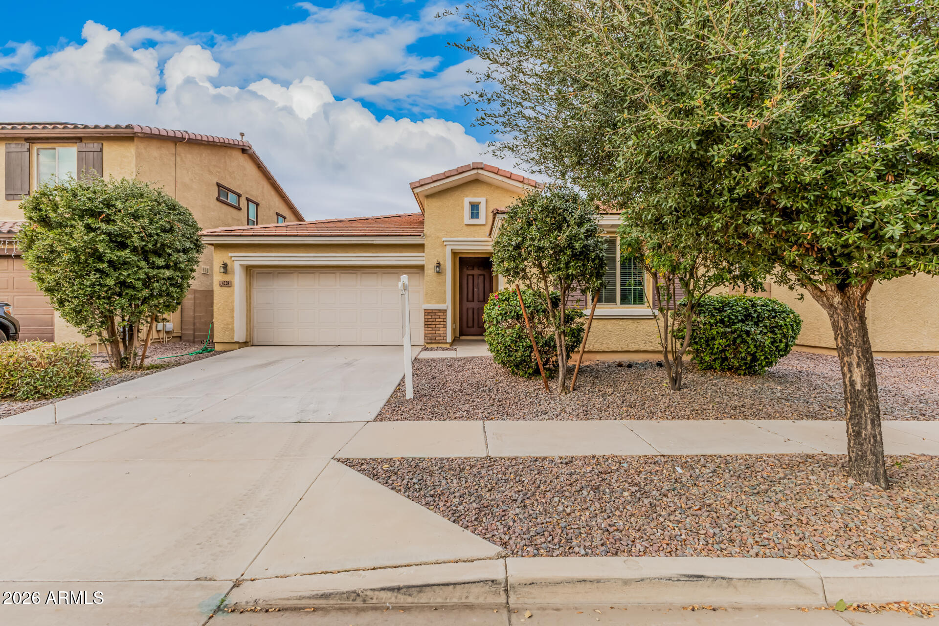 Become the proud owner of this lovely 3-bedroom, 2-bath residence in Montana Vista! You'll be delighted by the appealing open layout with high ceilings, a soothing palette, blinds, and durable tile flooring for easy maintenance. The well-appointed kitchen comes with granite counters, crisp white cabinetry, pendant/recessed lighting, stainless steel appliances, a handy pantry, and an island with a breakfast bar for casual meals. The primary bedroom features soft carpeting, an ensuite with double sinks, and a convenient walk-in closet. Imagine peaceful afternoons in the charming backyard, which offers a covered patio and pristine artificial turf for outdoor relaxation. Don't miss your chance to own this gem!