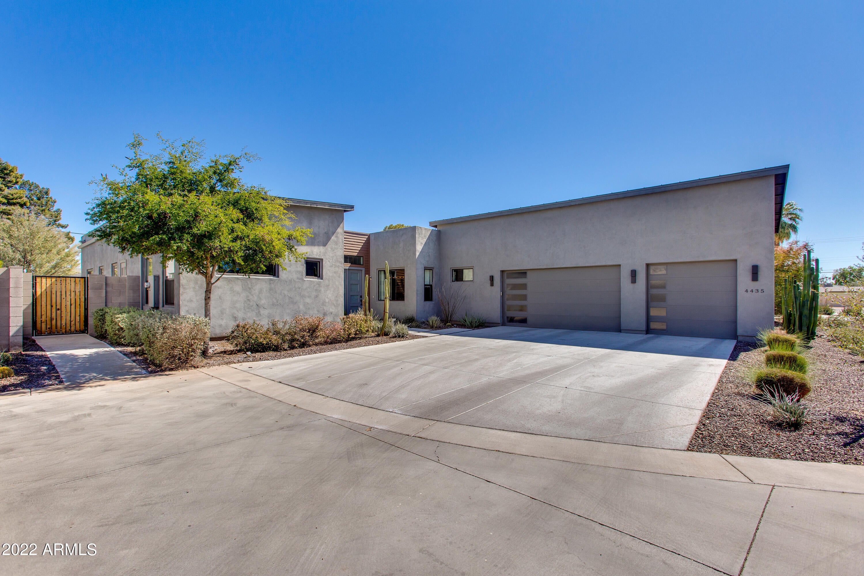 This is as turn-key as it gets! Located in a private cul-de-sac, this stunning contemporary home was built new in 2015 and features a massive 3 car garage, low maintenance backyard with pool, and modern day floor plan with high ceilings throughout. The versatility of the floor plan is rarely found in today's market with 4 bedrooms in a split plan, grand living areas, and a den room between the guest bedrooms that offers kids or guests the opportunity to have their own space. Just minutes from the best shopping and dining that Phoenix has to offer, this community will captivate the home-buyer looking for great space and location! Call today for a private showing!