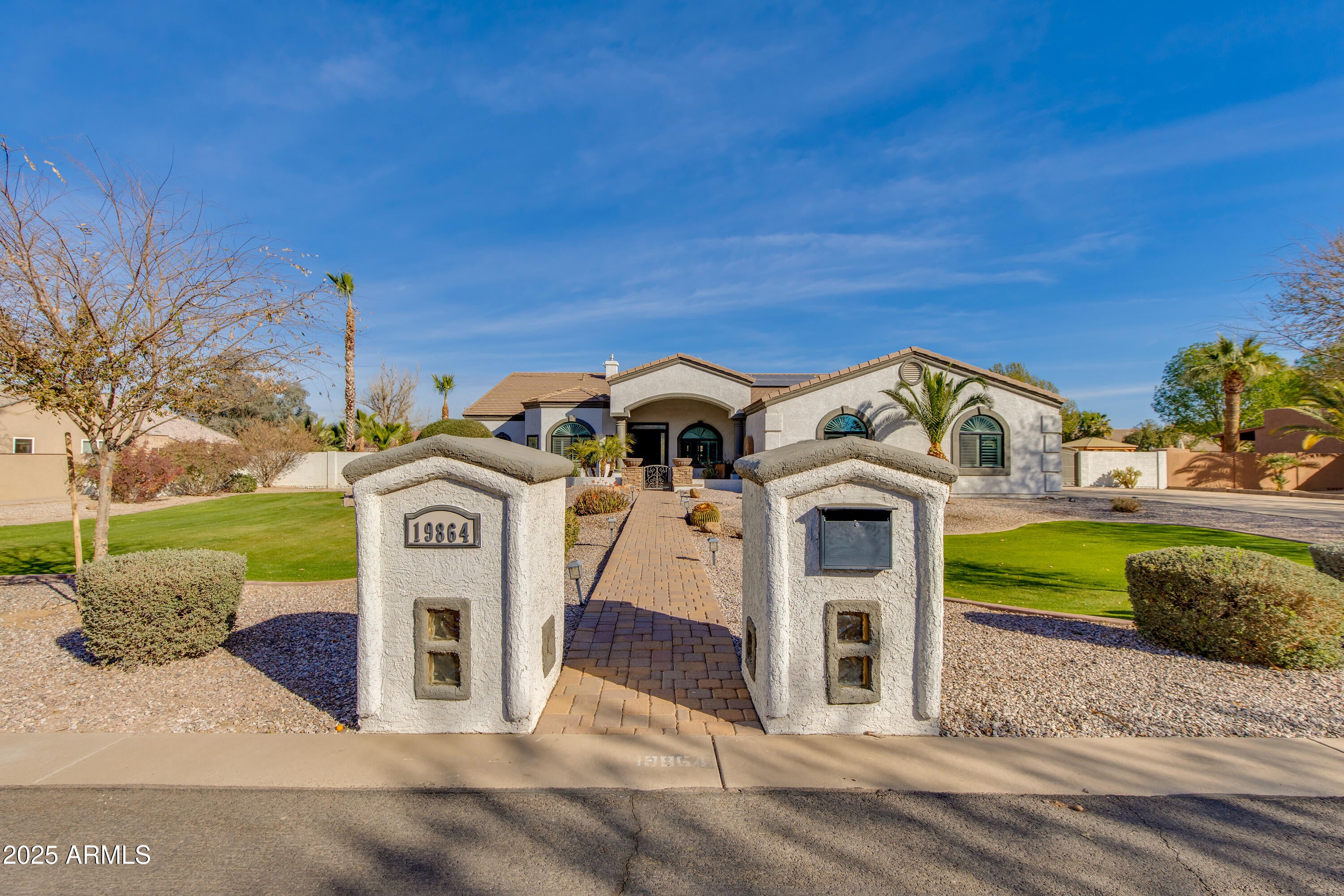 Experience living in a serene cul-de-sac within the coveted Circle G community. This custom home features an expansive layout with warmth and sophistication exuding throughout. Seamlessly flowing from the front entryway, to the gourmet kitchen, into the great room, and highlighted by a cozy stone fireplace. The tranquil primary suite was designed for ultimate relaxation and crafted for modern living. Each additional bedroom has a walk-in closet and private bathroom access, but the true beauty can be found outside in the surrounding acreage. Immerse yourself among Sonoran skies. Perfect for relaxation under the patio, enjoying the pool, gathering by the fireplace, or cooking in the outdoor kitchen. Make this house your home and experience the ultimate blend of luxury and comfort today.