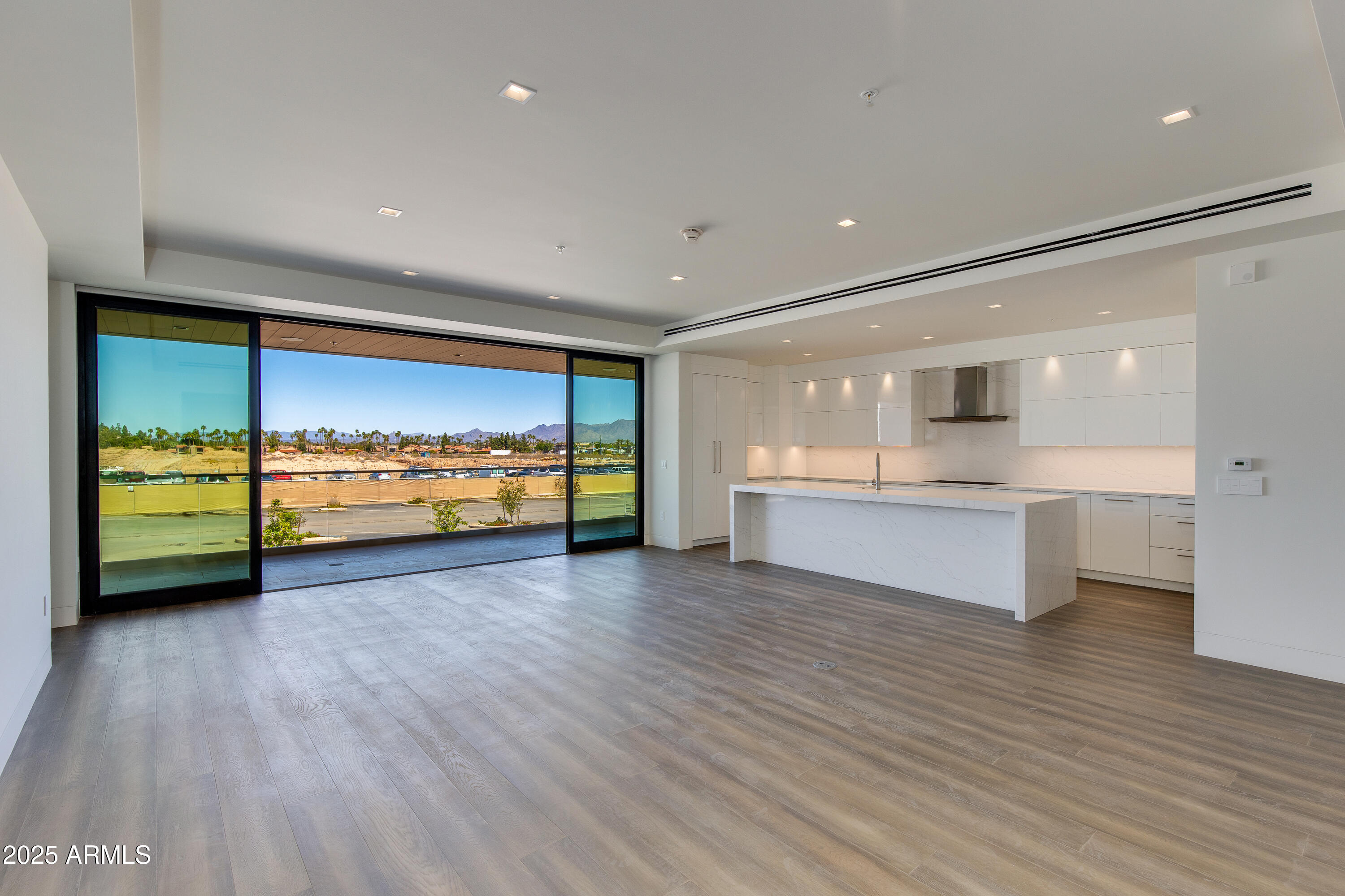 PERFECTLY LOCATED IN THE HEART OF PARADISE VALLEY AT THE HIGHLY ANTICIPATED RITZ CARLTON RESIDENCES! This spacious 1 Bed plus Den beauty features elegant wood flooring throughout, an entertainers kitchen with modern cabinetry, Sub Zero appliances an oversized waterfall island, gorgeous owners suite with serene spa like bath and built out closet systems. Light and bright with motorized shades, large balcony off Suite and main living area with fireplace and A+ views. The Amenities are second to none including exclusive pool/clubhouse access , well appointed gym and concierge services that only the Ritz Carlton name could hold up too. Must see.