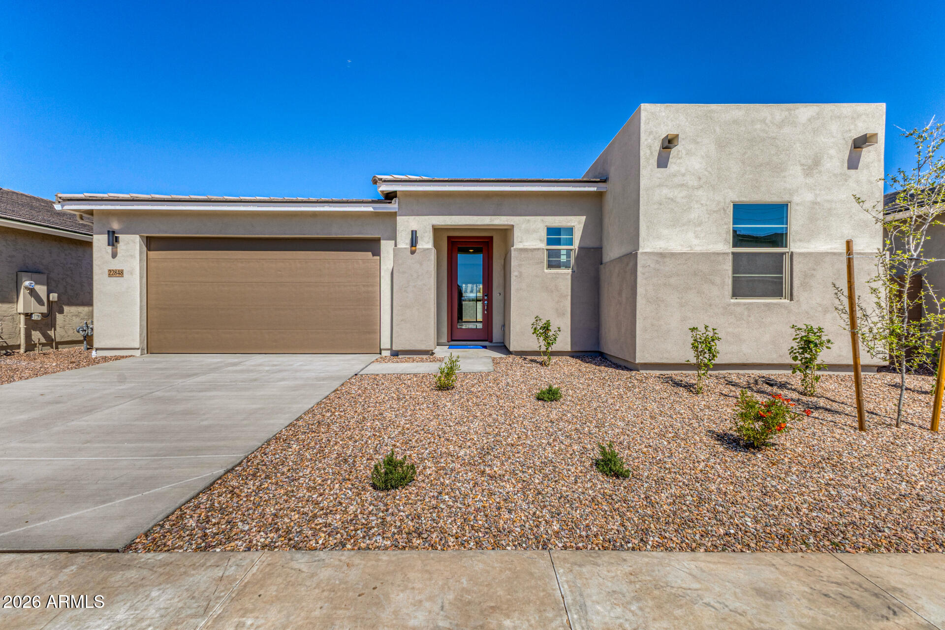 Brand new completed home, under construction in Queen Creek. Desert Modern exterior style. 3 bedroom, 2 bathroom, plus a bonus flex room and 3 car tandem garage. Gourmet appliances include stainless gas cooktop and chimney hood. Wood cabinets with quartz designer countertops. Tile throughout the home and plush carpet in the bedrooms. Home warranty included! Enjoy an amenity-rich lifestyle with community fitness center, sparkling pool and jacuzzi, pickleball courts, basketball, shaded play structures, play lawns, 2 dog parks, and more. PLEASE ASK ABOUT OUR INCREDIBLE FINANCE INCENTIVES!
