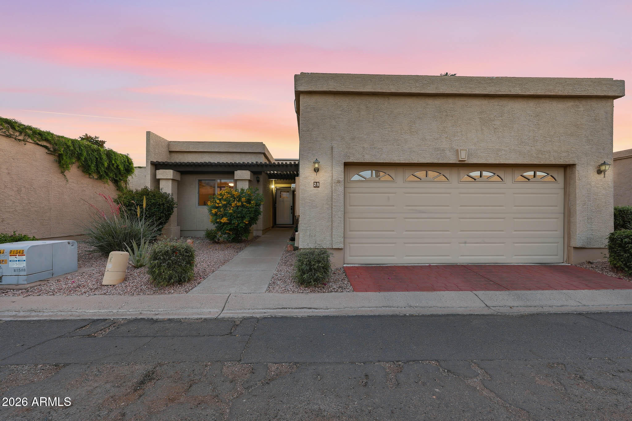 Here's your rare chance to own arguably the best Lakefront lot in La Mariposa Villas!  Walking into this generously sized 3 Bed, 2 Bath you're instantly greeted with high ceilings and flooded with tons of natural light, highlighted by the direct lake views.  This home has everything you need and want including a large primary suite with direct access to your patio with hot tub, ensuite primary bath with walk-in closet.  The kitchen was recently remodeled with stainless steel appliances and tons of counter space.  Your new flooring encompasses every square foot of this open floor plan.  Enjoy the outstanding location and amenities including steps away from the community pool, easy guest parking, and tennis courts.  Plenty of storage space with your 2-car garage.  Shortlist this one!