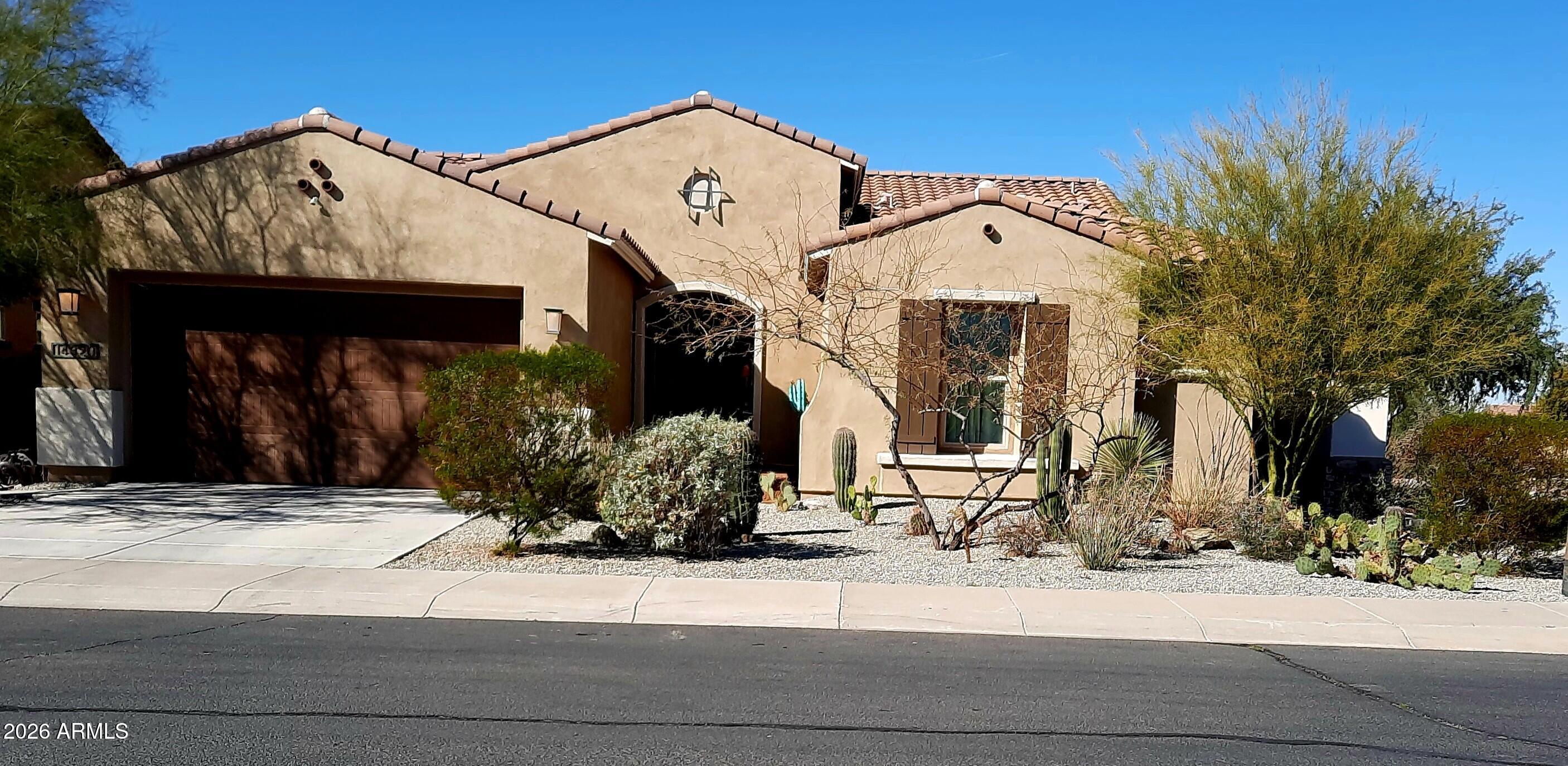 Beautifully located in the Estrella Mtns, this Corner Lot home sits across from a quiet Cul de sac with spectacular mountain views! This William Ryan home has 3+ bdrms, 2.5 baths, its own pool, 3 car garage and is located in a community full of amenities and near a wonderful park and play area. Enjoy a large flex space, ideal for a den/office, library or game room! A large open floor plan has an expansive kitchen that takes center stage with ample granite counter seating space, beautiful cabinetry, S/S appliances with gas cooktop, electric oven, built in Micro and a walk in pantry. Entertaining will be a breeze with dining space and a family room with beautiful views of your pool and living space! There are tile floors throughout, and a primary suite with a spectacular walkin shower. The 3 car garage has custom built in cabinetry, overhead storage racks and plenty of space for all your vehicles and toys! There is a utility sink in the large laundry room that also has added storage space. Estrella Mountain Ranch is a dynamic neighborhood with clubhouses, fitness centers, Restaurants, Lake Views, miles of hiking and biking trails and numerous clubs and activities to keep everyone busy! Find your niche, and enjoy the lifestyle you've always dreamed of! Come and visit soon...we'll be waiting for you!
