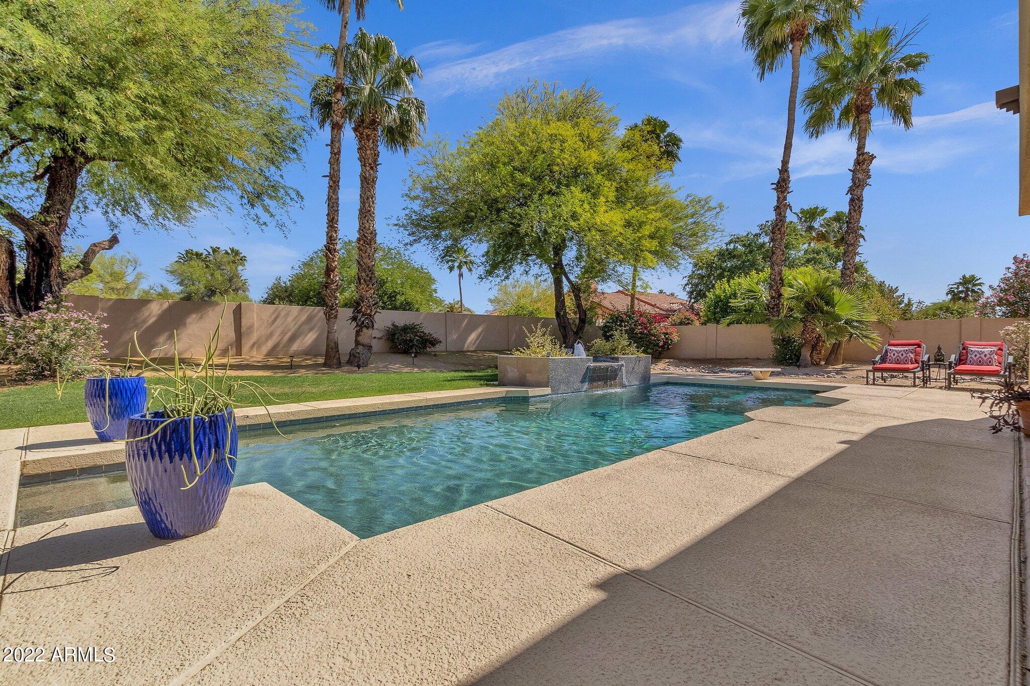 Charming adobe Southwest flair home on over a half acre cul-de-sac lot. Over 3400 sq ft of possibilities in your new open floor plan home, with split primary and three additional bedrooms, plus den! Home has been lovingly cared for by owners of more than 20 years. Quiet resort like backyard with sparkling pool, built in barbecue, sports area, desert scaping and REAL grass on prime North South facing lot. 3 car garage offers plenty of storage, and thoughtful storage throughout the home, and living with all on one level. NEW roof (2022) with a warranty and 2 NEW HVAC (2022 and one within the last 3 years), with warranty. Don't wait to make this Scottsdale dream your new home.