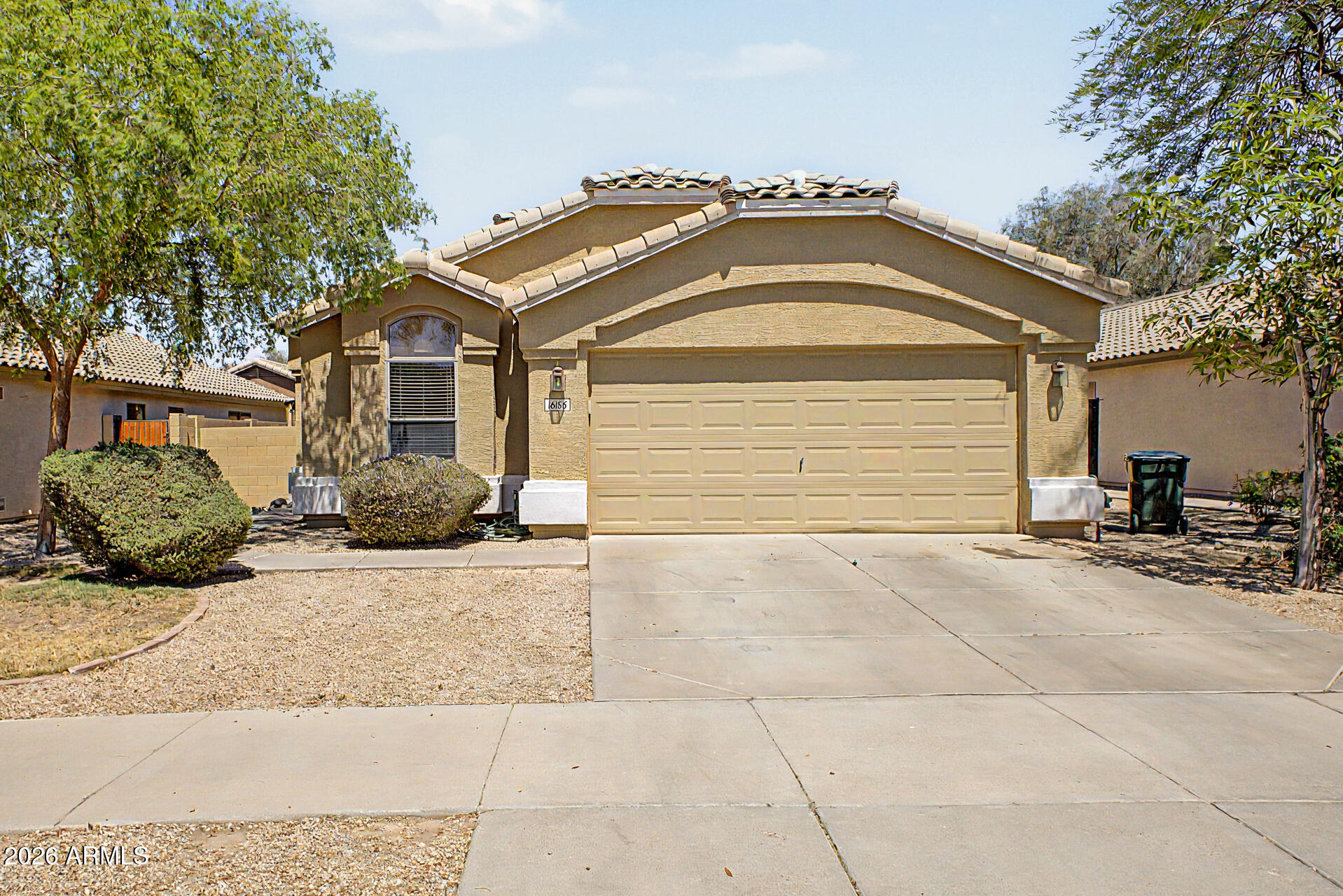 Welcome to your new home in Canyon Trails! This adorable home offers 3 bedrooms, 2 bathrooms, and a 2-car garage. Explore the bright and open interior, featuring vaulted ceilings, new plank flooring and interior paint. The kitchen features a breakfast bar with generous counter space, perfect for everyday living or entertaining. Get a good night's rest in the main retreat, including a private bathroom with double sinks and a separate shower & tub. Step outside to enjoy your extended covered patio- ideal for relaxing or hosting guests. Perfect home for a first-time homebuyer, vacation home or investment property! A credit can be negotiated for new carpet in the 3 bedrooms.