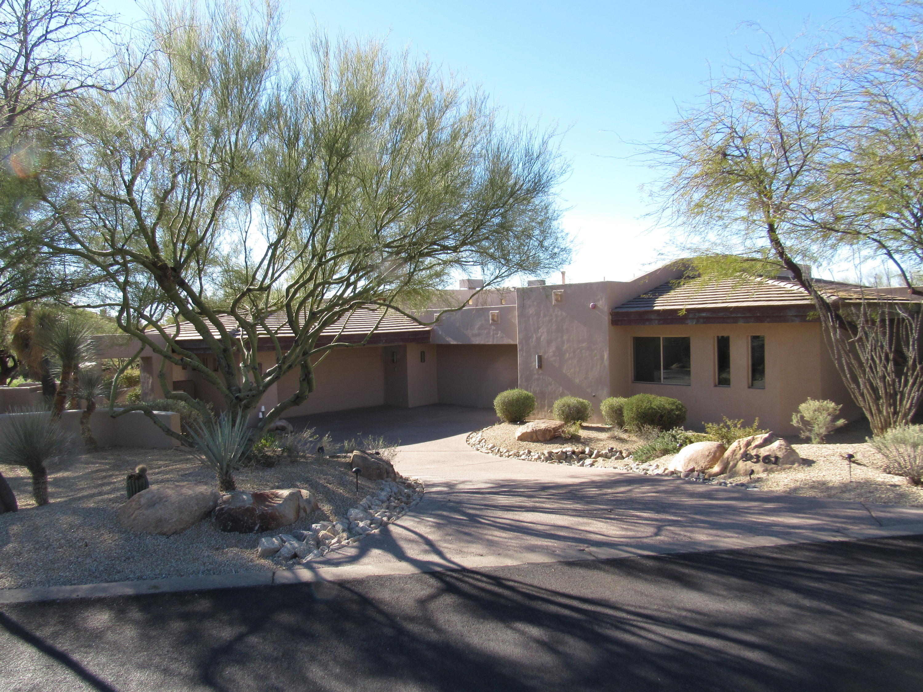 First time on market.  This custom 5 bedroom, four car garage home is located in the Village of Gambel Quail. Situated on a private lot on the 15th green of the Renegade golf course, this single level home has but 2 steps in entire home. Light and bright, the home features a nicely landscaped entry courtyard with water feature, a spacious patio with pool, spa, built in BBQ, fireplace and upper view deck.  Interior has lots of storage, nicely appointed kitchen with large family room. A great home for entertaining. Home may be purchased with or without membership to the Desert Mountain Club.





e