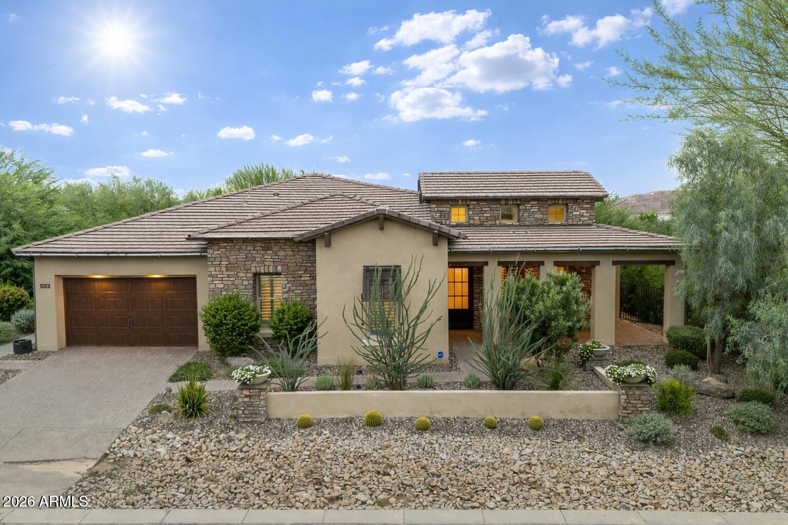Bellissima's best value: the most exceptional home in the neighborhood at the most compelling price. This 3BD/3.5BA + den & media room delivers luxury at every turn, Control4 smart home, motorized blinds, chef's kitchen with built in Sub-Zero and upscale appliances, stone countertops & sliding glass doors that flood the home with light. Wraparound covered patios, ramada with built-in BBQ, gas firepit & low-maintenance turf create an outdoor sanctuary for entertaining or simply unwinding. Primary suite is a private retreat with spa bath & custom closet. Lock-and-leave ready. Lowest price per sq ft of any active home in Bellissima. This home is also listed for lease. Welcome to Bellissima, Cave Creek's Most Exclusive Address!
Tucked behind a private gate in beautiful Cave Creek, Bellissima is one of the Valley's best-kept secrets. With fewer than 50 homes, this intimate luxury enclave by Monterey Homes offers something increasingly rare in the Phoenix market: genuine privacy, thoughtful community design, and neighbors who actually know each other. Wide-open common spaces and generous setbacks between homes create a sense of breathing room that larger subdivisions simply can't replicate. At the heart of the community sits a beautifully landscaped park with walking paths, mature desert trees, a stone ramada with picnic tables, and a play area, a rare and welcome amenity in a community this size.
An Exceptional Home at an Exceptional Value
5411 E Duane Lane is currently the lowest-priced home per square foot among all active listings in Bellissima, offering the same luxury finishes, gated community lifestyle, and Cave Creek address at a price that represents a genuine opportunity. For the discerning buyer who has been watching this neighborhood, now is the moment.
Inside: Luxury in Every Detail
From the moment you step inside, the quality of this home is unmistakable. The open split floor plan flows beautifully, with 3 spacious bedrooms, 3.5 baths, a private den, and a dedicated media/flex room, space for every lifestyle, whether that means a home office, a guest suite overflow, or a true cinematic escape.
The chef's kitchen is appointed with professional-grade appliances and striking stone countertops, opening seamlessly to the main living area. Expansive sliding glass doors span multiple walls, flooding the home with natural light and creating an effortless connection between indoors and out. Crown molding, designer wall tile, and an electric fireplace add warmth and texture throughout.
Smart Home = Effortless Living
This home was built for the buyer who wants luxury without the hassle. The full Control4 smart home system puts lighting, climate, security, and entertainment at your fingertips, from the sofa or from across the country. Motorized blinds Hunter Douglas blinds with remote rounds out a home that is as intelligent as it is beautiful. For the lock-and-leave buyer, this level of automation is invaluable.
The Primary Suite: Your Own Private Retreat
The primary suite is a true sanctuary, generously sized, quietly positioned, and finished to a standard that rivals the finest resorts. Dual vanities, a spa-inspired walk-in shower, a soaking tub, and a custom-designed closet with built-in safes make this a space you'll never want to leave.
Guest Suites: Privacy and Luxury for Everyone
Split thoughtfully from the primary, both guest bedrooms feature their own beautifully tiled ensuite baths, perfect for visiting family, long-term guests, or the buyer who values giving everyone their own private space.
The Backyard: Your Own Private Oasis!
The outdoor living at this home is genuinely extraordinary. Wraparound covered patios on three sides of the home create shade and comfort in every season. The deluxe ramada with built-in BBQ, sink, and TV hookup is an entertainer's dream. A gas firepit, lush artificial turf, and mature fruit trees complete a backyard that is as low-maintenance as it is impressive, no pool upkeep, no weekend projects, just pure enjoyment.
The Garage
The two-car garage features an epoxy floor and a built-in electric vehicle charger, with additional space that was thoughtfully designed to feel generous rather than cramped. The former tandem third bay has been converted into the home's media/flex room, a smart upgrade that adds true living space.
Cave Creek: The Lifestyle Behind the Address
Cave Creek offers a lifestyle unlike anywhere else in the Valley, authentic desert character, world-class hiking and riding trails, a thriving local dining and arts scene, and a pace of life that feels intentional. Top-rated Cave Creek Unified School District serves the area, making this an equally compelling choice for families. And with easy access to Scottsdale, the 101, and Sky Harbor, you're never far from anything!