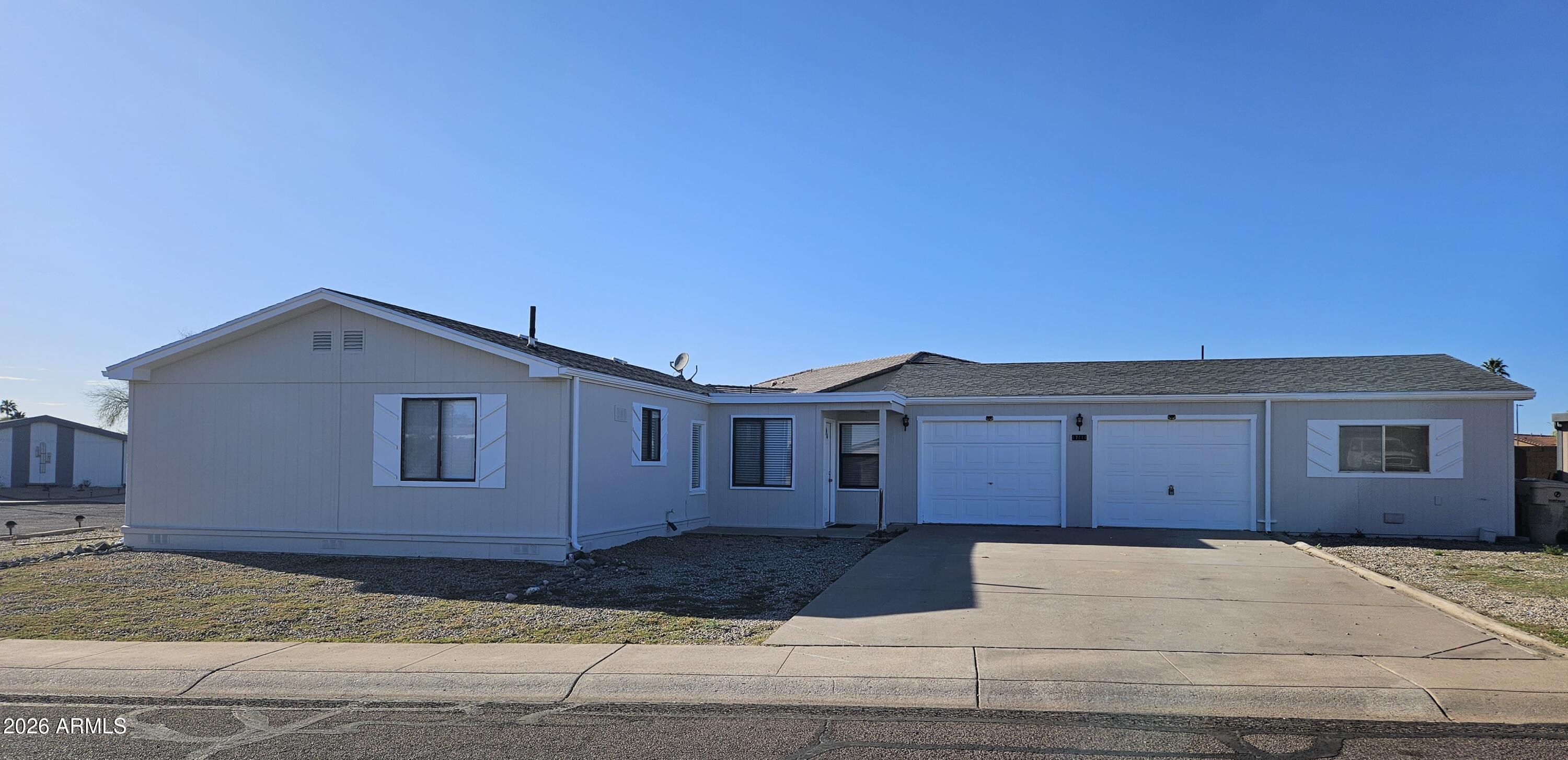 2 bed home/2 bath w/den. A HUGE plus is a building approx. 980 sq ft w/2 garage stalls including a huge workshop area. Corner lot within a cul-de-sac. Not age restricted and no HOA. New flooring installed in most of home. Freshly painted interior and  exterior.  Main closet w/built in shelving and drawers. 2nd bdrm w/built in bookshelves and own bath. Office/den has built in bookshelves & computer area. Lots of storage. Front has circular drive - Don't miss out on this one. Buyer to verify all facts. Close to store, mall, bank, hospital and the 101