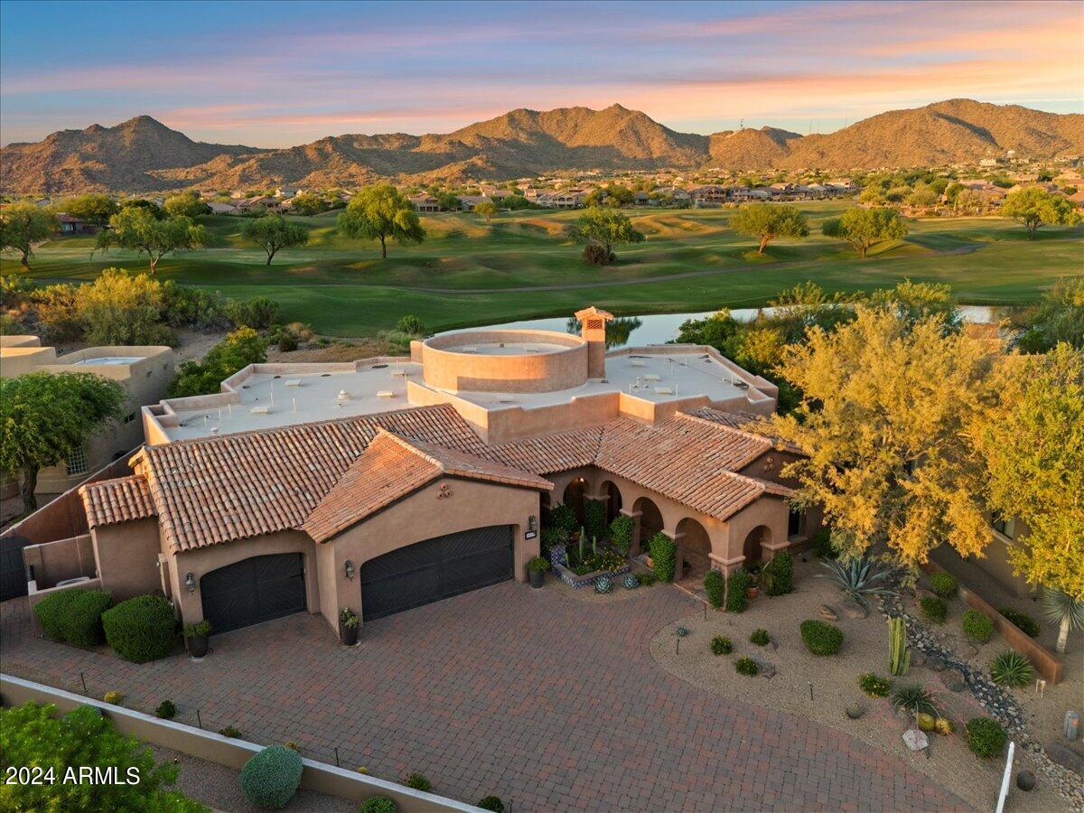Peace & Tranquility in Las Sendas!  Gorgeous 5,148 sq ft custom home loaded with exquisite Spanish architectural details and expansive golf course & mountain views. Guests are welcomed by a spacious great room that opens to the gourmet kitchen with a sunny breakfast room overlooking the golf course. The primary suite is true retreat with a Cantera fireplace, steam shower, private hot tub & walk-in closet with a laundry room. Three additional bedrooms on the main floor each have an ensuite bath. A secret slide offers a fun way to access the spacious walkout daylight basement with a large family room, home theater, 1 bedroom ,1 bath & access to a large turf yard. A huge laundry/ craft room and an air-conditioned 3 car garage offer plenty of space for hobbies and projects! Fantastic location in the gated enclave of The Preserve and situated on the 1st Fairway of the Las Sendas Golf Course.

The community of Las Sendas offers great amenities including two pools, pickleball and tennis courts, parks, and miles of hiking and biking trails. Great community activities include a book club, hiking club, paddleboarding club, kids summer camp, tennis and pickleball lessons, Mesa Food Truck Fridays, holiday events, and so much more. Located just minutes to the 202 freeway, 20 minutes to both the Sky Harbor and Mesa Gateway Airports, 30 minutes to Scottsdale, and a short drive to the Salt River and Saguaro Lake, Las Sendas is the perfect location to enjoy city and outdoor living!