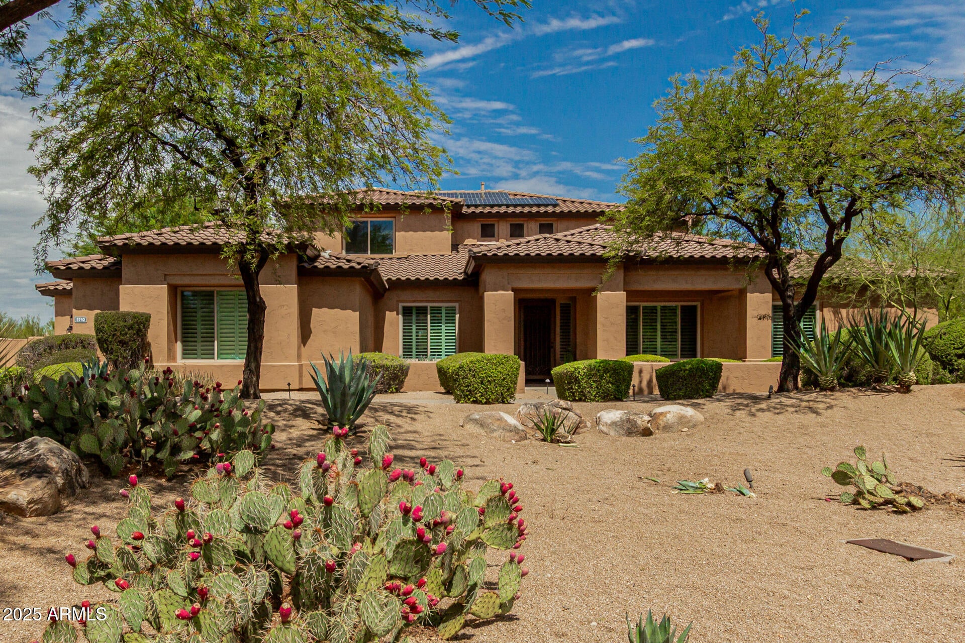 Luxury Scottsdale living awaits in the gated Preserve community! Move in ready! Enjoy a brand new roof, chef's kitchen with Wolfe appliances, large island, custom baking center, fresh paint, hardware and new carpet. Main level master suite, office, jr. suite, and expansive laundry. Four car garage.  Upstairs 2 extra bedrooms, double vanity full bath with large loft. Very private resort-style backyard with pool, spa, BBQ island, views, open green space, mature landscaping includes easy care turf.  Owned solar, whole-home Generac, and Tesla charger for energy efficiency. Incredible value close to premier Scottsdale dining, shopping, top-ranked schools, hiking, and easy access to Loop 101. Move-in ready for buyers seeking quality, comfort, and convenience in North Scottsdale! o shopping, dining, hiking, biking, schools, freeway access a short distance to 51 or the 101.   Come experience life at the Preserve!