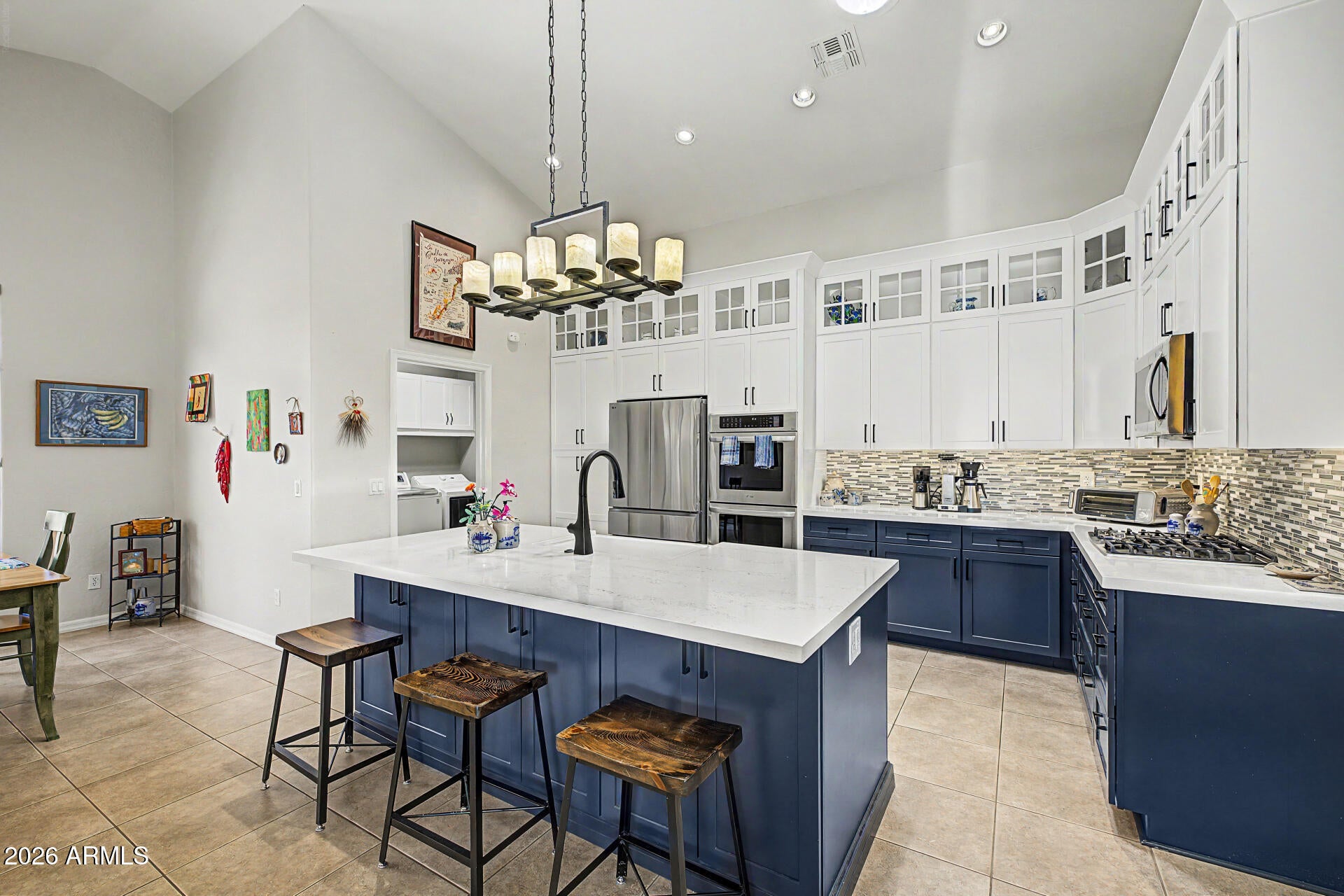 You must see this Single Story Remodeled POOL home! *New Roof 2022* Two newer AC units* 4 Bdrm(1 is an Ensuite w a separate exit door), 3 Bath, 3 Car G,  Open layout w/Vaulted ceilings, Huge Greatroom w/a gorgeous Stacked Stone accent wall w/an Electric 72'' LED Fireplace, Floating Shelves & a new sliding door. There is even a Custom Bar in the Greatroom w/a Wine Fridge! The remodeled stunning Custom Kitchen has upgraded soft close Cabinets, Quartz countertops, mosaic tile backsplash, LG SS appliances, DBL Ovens & an island w/a breakfast bar. The Main Bdrm has Plantation shutters, New sliding door & access to the backyard, Main bath has dual sinks & a Lg walk-in closet.  All but 3 Windows have been replaced.  The Backyard has a Lg Patio, Pool Deck w/travertine pavers & a Built-in BBQ. There are so many quality upgrades in this home that it is hard to list them all.  It's an  extremely well cared for home in Palm Valley, which is close to shopping, Golf courses & restaurants. More upgrades include an Overhead Thermacore insulated garage doors. New Paint inside & out. Main irrigation system has been changed to PVC. Custom closets in the Main Bdrm, Office, Craft Rm & Laundry Rm.  Lg Storage Cabinet in the Craft Rm, which could easily be converted back a Bdrm, The 3 car Garage has a SS sink, built in Cabinets, a Hot water Circulating pump.  Plaintain Shutters & Hunter Douglass window dressing thru-out the home, 2 New Solar Tubes to brighten up the main Living areas. Upgraded Ceiling Fans inside & out. New outdoor lighting & NO NEIGHBORS ON THE OTHER SIDE OF THE STREET!

Imagine peaceful afternoons with loved ones in the lovely backyard, featuring a covered patio, a built-in BBQ, stylish pavers, and a sparkling pool for refreshing dips on hot summer days. Make this gem yours today!