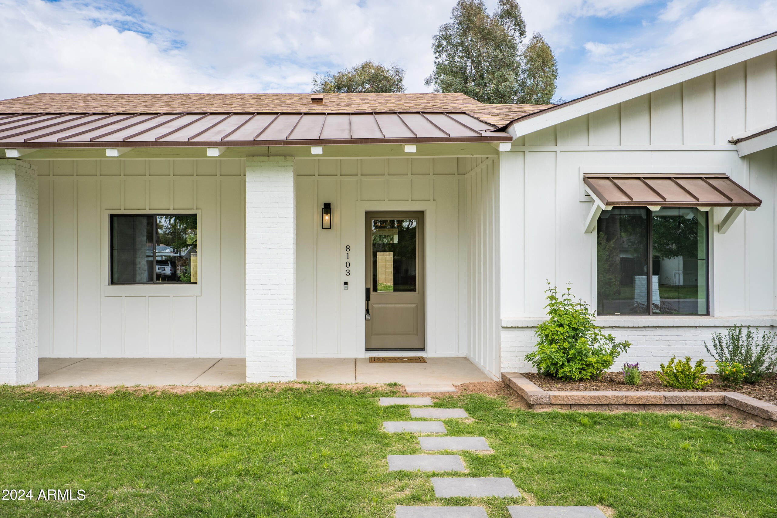 This newly built home is situated in the Royal Palm neighborhood and sits on a picturesque and quiet street in the heart of the Sunnyslope High School district. Entering, you are greeted with soaring ceilings, an expansive great room, a bright, elegant, and modern color palette, and a view straight back to your large, floor-irrigated lot. The kitchen is a stunning entertainment area and sits prominently as the heart of the home, featuring a large island, with plenty of seating room, stainless appliances and a gas range. Finding a brand new home, on over a third of an acre, with the three car garage in this neighborhood is exceedingly rare, so don't miss your opportunity to own the newest home in one of the most desirable and in-demand neighborhoods in North Central Phoenix.
