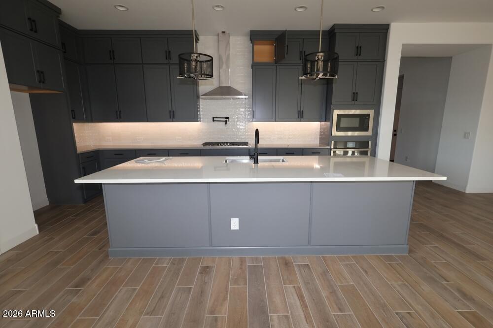 BRAND NEW single level 4 bed, 3 bath with study and 3 car garage; walk-in closets in beds 2 and 3; gorgeous chef's kitchen with modern stacked cabinets, quartz countertops and clean, modern white tile backsplash; TONS OF STORAGE; 10' ceilings and 8' doors, huge energy efficient windows and large covered patio out 9' sliding glass doors; spa-like owner's bath with large walk-in floor to ceiling tiled shower and double vanities and His/Her closet space; upgraded carpet/pad and plank tile throughout; 2x6 CONSTRUCTION AND EXTENSIVE NEW HOME WARRANTY.