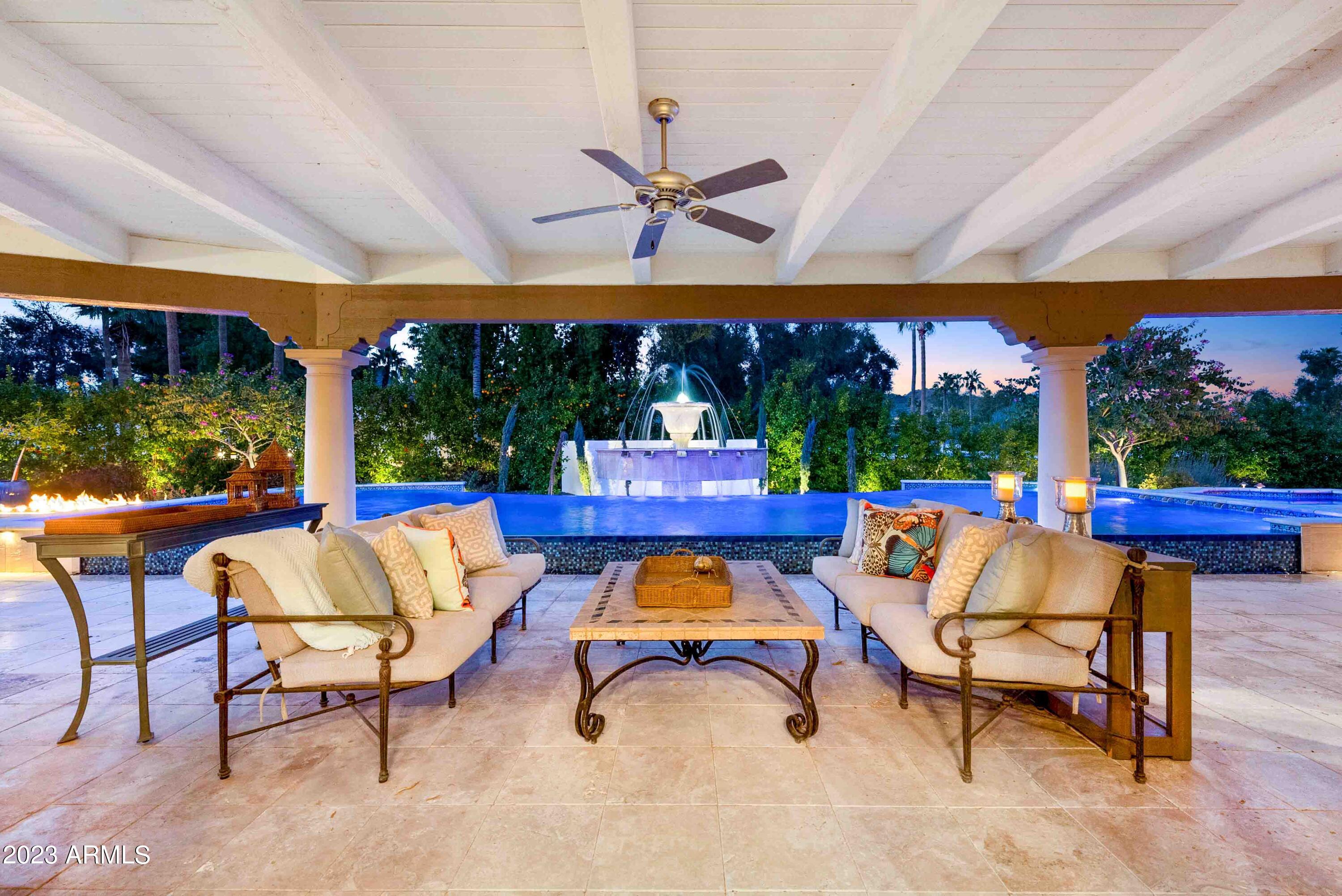 Elegant Estate located in the sought after guard-gated community of Finisterre. The home offers intimate living spaces with views of Camelback Mountain throughout and a Secret Garden. Over $1.5M in updates to the home, which include a new casita, master bath, additional en-suite baths, roof, front door, resort style pool & spa, outdoor kitchen, extensive architecturally designed landscaping and much more. The main home consists of 6,833/sqft, 4 en-suite beds/4.5 baths, office, theater room and 3 car garage, The 925/sqf detached casita includes a living room, full kitchen, 3/4 bath and a separate bedroom with a walk-in closet and laundry. This home is minutes away from the new Signature Ritz Carlton, which will offer world class shopping and restaurants.