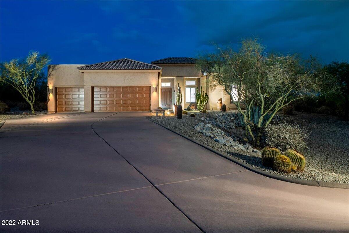 Incredible luxury combined with amazing finishes to create this stunning North Scottsdale estate home quietly nestled on nearly an acre of pristine high desert that gently whispers serenity in all directions! Owners spared NO expense taking this model perfect beauty to the highest levels of fit & finish. No corners cut with over 120k spent on windows & doors alone. Totally renovated baths, new roof in 2022, newer pool & spa, new garage doors, new soft water system, virtually all new fixtures throughout! Split floorplan gives the oversized owner's retreat perfect privacy & features two closets & a completely new spa bath that stuns! Outside you'll enjoy total privacy in your resort style backyard, with little to hear but the breeze gently rustling the desert landscape-This is paradise!