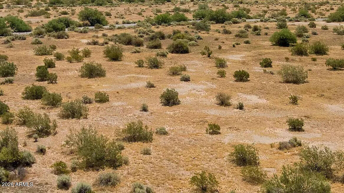 REDUCED to $7,995 -- Rare single-family zoned 0.29-acre lot inside Eloy city limits, platted and ready for stick-built construction. City waterline is 300 ft away on Tonto; gravel road access 500 yards from paved Sunland Gin Road. Unimproved lot in FEMA Zone X. Excellent I-10 access; minutes to Robson Ranch, Skydive AZ, Promenade Mall and major employers like Lucid, Kohler, Schuff Steel and Walmart are driving growth. New subdivisions in the area.