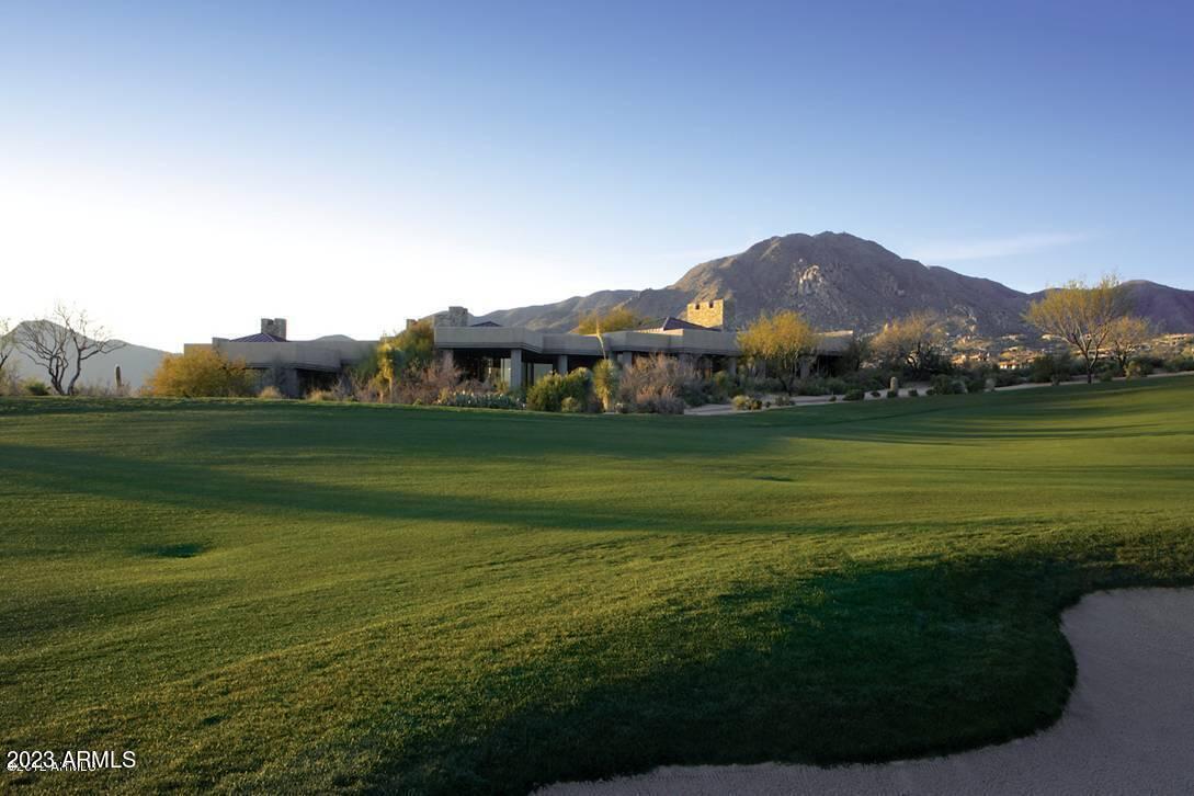 Golf Membership Available!!! Fabulous 850 Square Foot Guest House in the heart of Desert Mountain. This contemporary gem is nestled at the end of the cul-de-sac in classic contemporary design situated perfectly on the 14th hole of the Apache Golf Course in North Scottsdale. Wonderful gourmet kitchen, family room, living & dining room complete with bar, wine cellar & Butler's pantry. The spacious primary suite includes a sitting area, exercise room/office, and a luxurious bath with 2 spacious walk-in closets. The guesthouse is a dream come true with charming sitting room, bedroom and kitchenette plus separate entrance. The superb south facing terrace with refreshing pool, spa and waterfall make this the ideal desert retreat. See document section for club details.