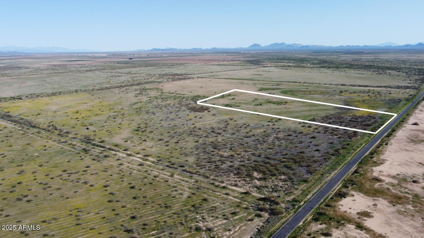 Great property with a lot of potential close to the proposed HWY 11. A little over one mile south of Arizona City with paved access and electric less than 0.5 miles to the north on Sunland Gin Rd.. Flat land with natural vegetation. So many development options  with this 13+ acres. The 27 acres to the north of this property are also for sale to complete the 40 acres. Great opportunity to own up to 40 acres on this major road.