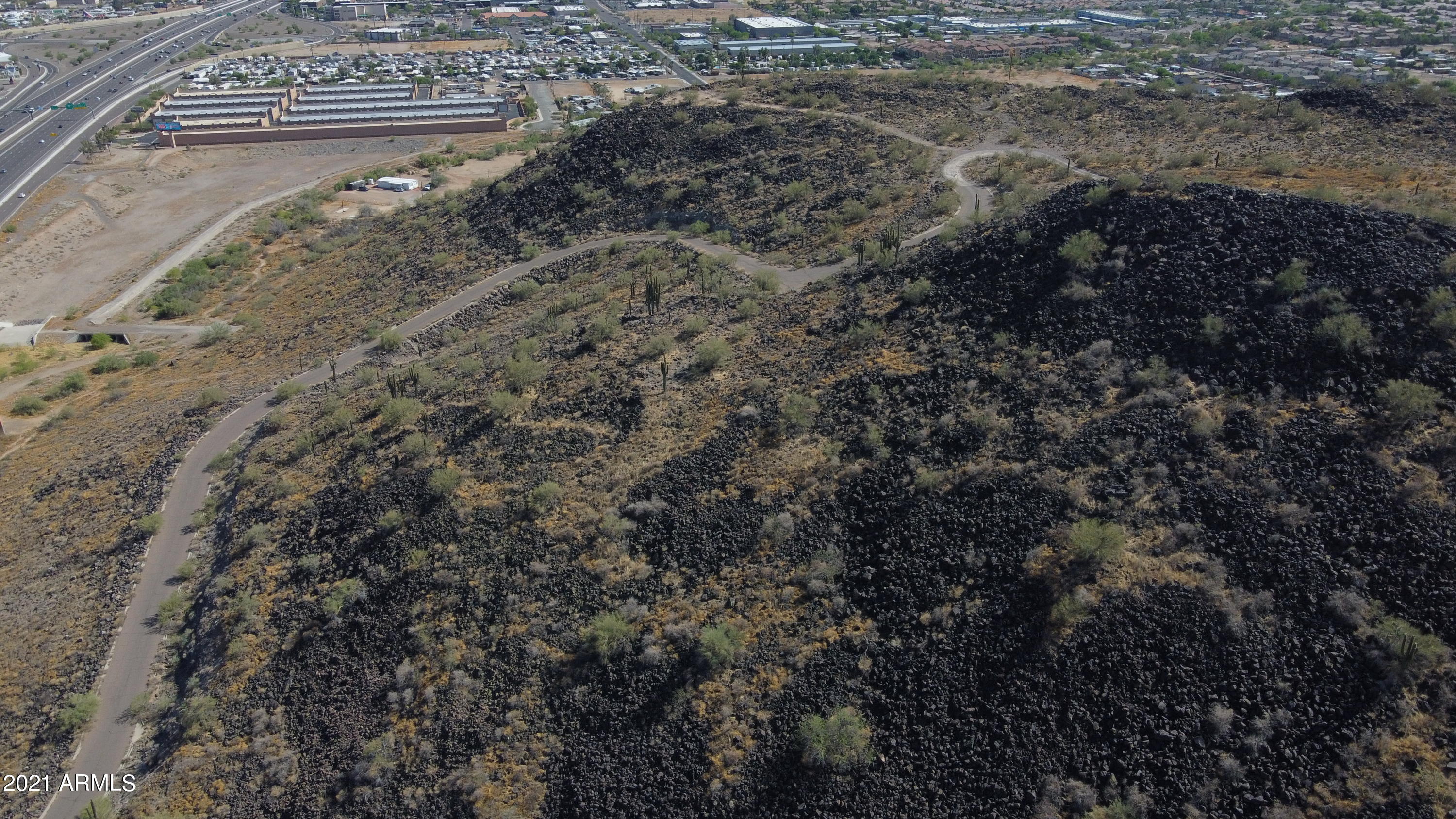 Exceptional development opportunity spanning 36.45 acres.  Ideally positioned for a large-scale residential or mixed-use project. The property carries proposed plans for a 207-unit combined apartment/condo development.  Hillside Approval and Prelim Site Approval already in place, offering a strong head start in the entitlement process.

Nestled in a striking mountain setting and surrounded by State Trust Land, this parcel delivers privacy, protected surroundings, and expansive mountain and city views

Located in close proximity to major employment hubs including Taiwan Semiconductor, as well as entertainment and shopping. This site is well positioned to meet growing housing demand. Ideal for residential development, multifamily, or potential mixed-use with rezoning.