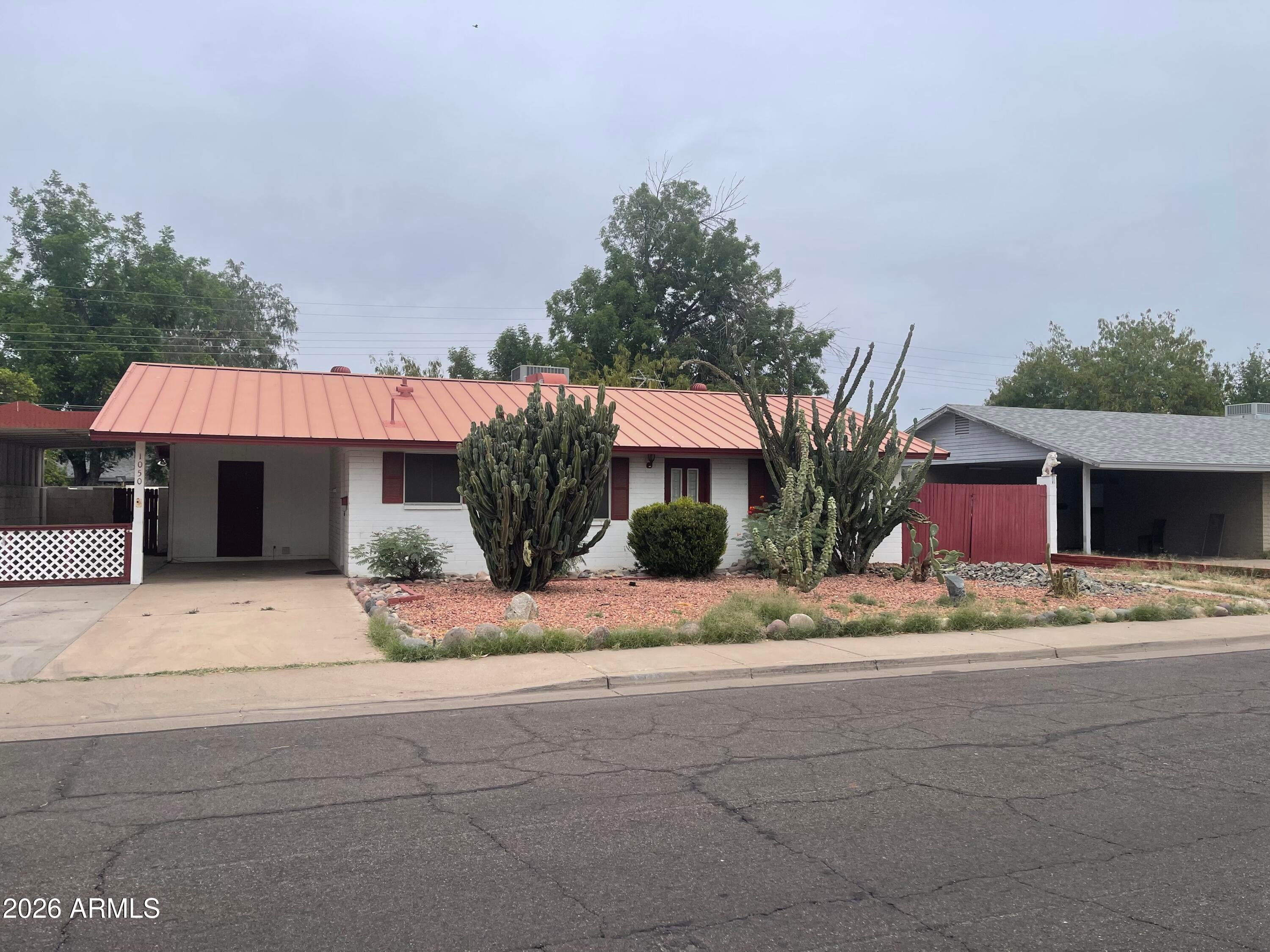 3 bedroom 1 3/4 bath block home with metal roof. Covered patio enclosed. Laundry and hot water tank off carport. Investors required to disclose wholesale status. 10% earnest allowed.