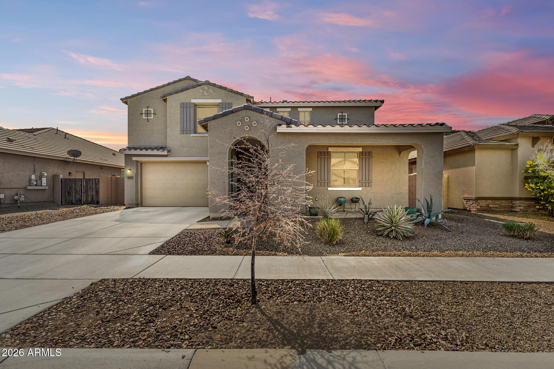 Welcome to this stunning 5-bed, 4-bath home in the desirable June Skies community! Designed for modern living, the main floor features a rare bedroom and full bath downstairs, perfect for guests or multi-gen needs. The gourmet kitchen is a chef's dream, boasting a gas cooktop, double ovens, and a huge island. Upstairs, a versatile loft adds the perfect second living space.

The backyard is a clean slate, ready for your dream pool or custom landscape! Enjoy prime Laveen living with fast access to the Loop 202, South Mountain hiking, and local golf. You're minutes from new shopping, dining, and top-rated schools. This 2017 build combines space, style, and a killer location. Don't miss out!