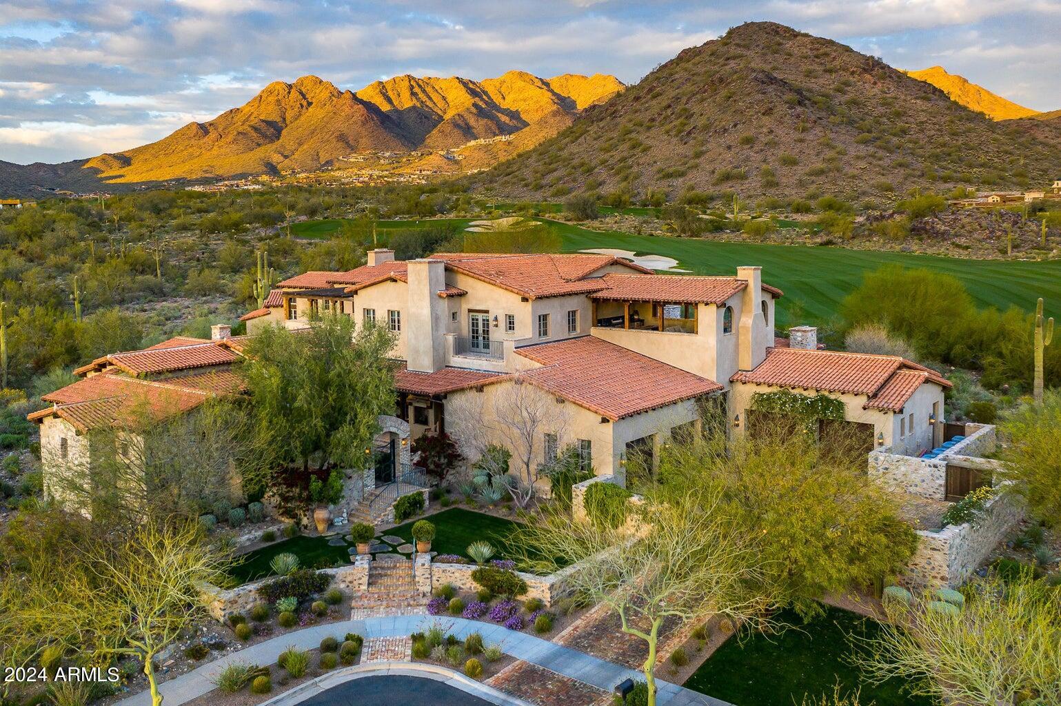 Stunning and sophisticated Ranch Hacienda residence in Silverleaf's prestigious Horseshoe Canyon deftly sited along the 2nd fairway. A true open floor plan flows for seamless Arizona outdoor living with charming courtyards, pool and spa, gardens and loggias that capture amazing views. 2016 build by Linthicum Custom Builders, one of the premier builders in the Western US; this truly private 10,437sf home is a masterpiece of exquisite craftsmanship and detail. Featuring extensive stonework and millwork contrasted with expansive walls of metal and glass, this house perfectly showcases the lush landscaping and countless amenities. All (6) bedrooms are en-suite, including the two-bedroom casita with kitchenette and laundry. (3) dedicated guest rooms in the main house, exercise room, glass wall walk-in wine wine room and lounge, glass elevator, bar, true chef's kitchen with double islands, and full back/catering kitchen. The primary suite is a sanctuary with a sitting area, soaking tub, indoor and outdoor showers, and separate closets. Multiple outdoor patios allow for entertaining and relaxing at the pool and spa, the indoor/outdoor bar, outdoor kitchen with pizza oven, or amongst the many fireplaces and water features or take the short walk to the Silverleaf Club and enjoy world class amenities that make it one of the most exclusive golf and country club communities in the Southwest.
Offered fully furnished. 100% turnkey with cutlery, bedding, plants and more.  

Silverleaf, located in North Scottsdale, Arizona, is a prestigious guard gated community known for its luxurious estates, exclusive golf courses, private Club and stunning desert landscapes. The Tom Weiskopf-designed Silverleaf Golf Course is a highlight for golf enthusiasts. With a blend of Spanish and Mediterranean-inspired architecture, the community offers a high standard of living, including upscale amenities like spas, fine dining, and exclusive shopping. Residents enjoy a harmonious balance between modern luxury and the natural beauty of the desert environment, making Silverleaf a sought-after destination for those seeking an exceptional lifestyle in North Scottsdale.