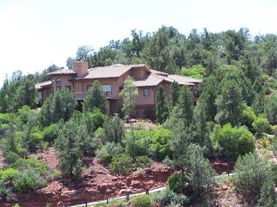 SPECTACULAR 4.7 ACRE SITE WITH MARVELOUS 3 BD.3 1/2 BA HOME/LARGE MASTER SUITE/OFFICE/GUEST WING W/2 BRMS AT OTHER END OF HOME/GREATRM/KITCHEN SET UP FOR ENTERTAINING WITH DECKS OVER LOOKING ENTIRE R/R SPECTRUM/FANTASTIC WATER FEATURE AT ENTRANCE/A ONE OF A KIND SETTING!! MUST SEE!!