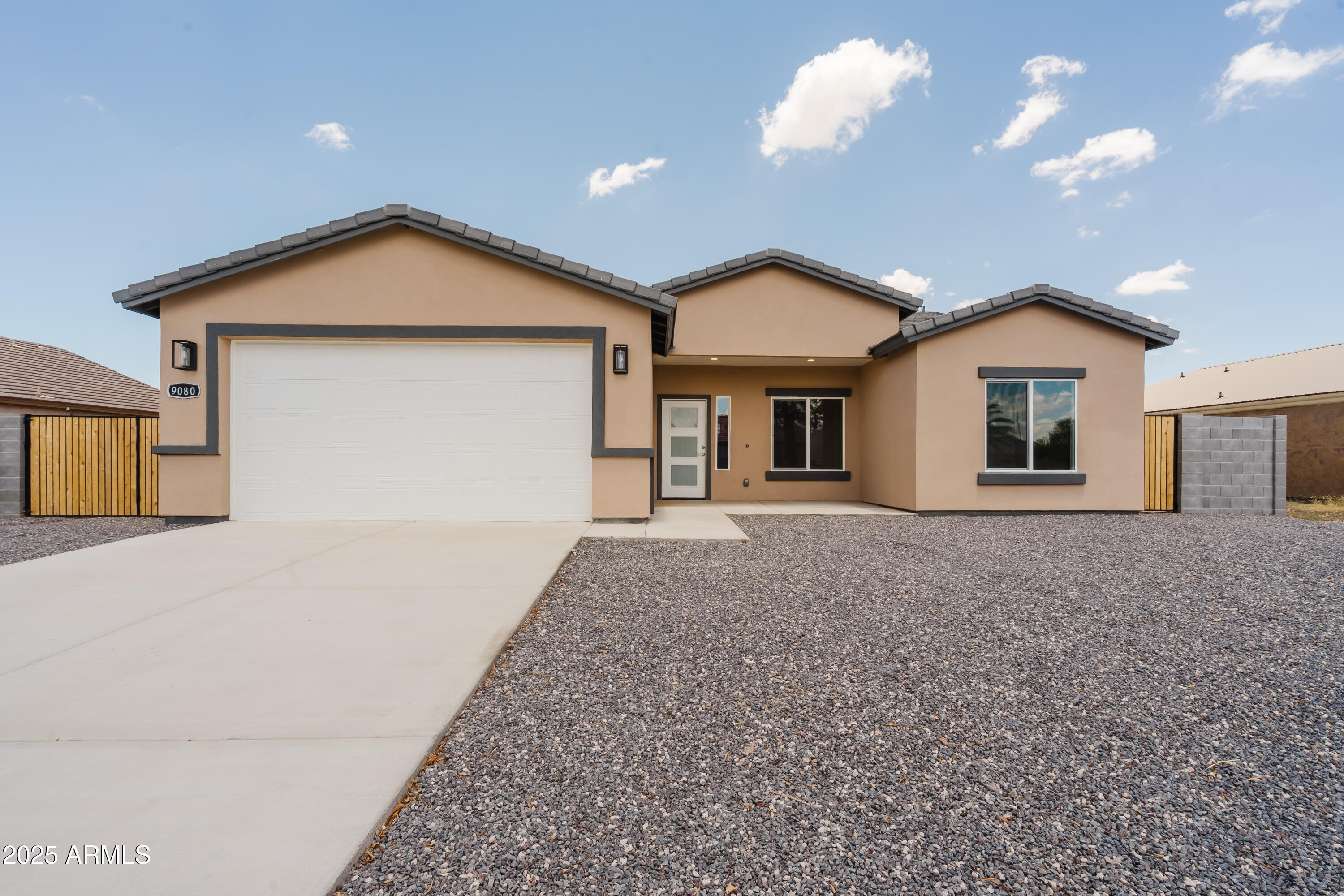 Discover your dream home at 9080 W San Lazaro Dr in the rapidly growing community of Arizona City! This stunning new build offers 4 spacious bedrooms and 2 bathrooms, thoughtfully designed with modern living in mind. The heart of the home features a gorgeous kitchen with sleek granite countertops and a stylish island that seamlessly flows into the dining area—perfect for entertaining. This house comes with stainless steel appliances including, microwave, dishwasher, fridge and stove. Enjoy the abundant natural light that fills the inviting master bedroom, creating a warm and relaxing atmosphere. Don't miss your chance to own this beautiful home in a location that's on the rise!