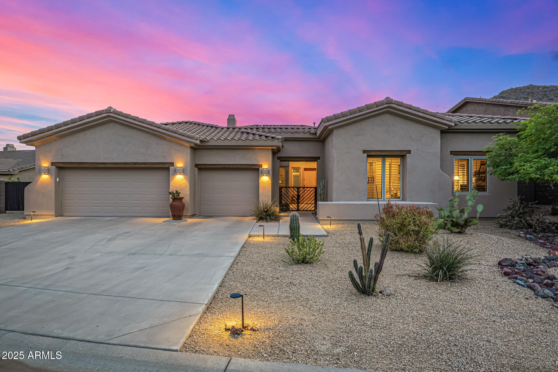 Tucked inside Hidden Hills in Scottsdale, this beautifully maintained desert retreat delivers the privacy buyers crave—backing to a natural arroyo with no homes across the street for open space, peaceful views, and true indoor/outdoor serenity. Enter through a gated courtyard into a light-filled, soaring-ceiling interior with expansive windows and an inviting open layout.
The gourmet kitchen shines with quartz countertops, crisp white cabinetry, a generous island, and a Wolf gas rangetop—ideal for entertaining or everyday living. The expansive primary suite features a sitting area, oversized walk-in closet, and spa-style bath with soaking tub and separate shower. A flexible den/office can also serve as a 5th bedroom.
Enjoy a resort-style backyard with covered patio, sparkling pool... and picturesque McDowell Mountains backdropplus nearby scenic trails for hiking and exploring. New AC, excellent upkeep, and a rare private setting make this home a standout value in a premier gated location.