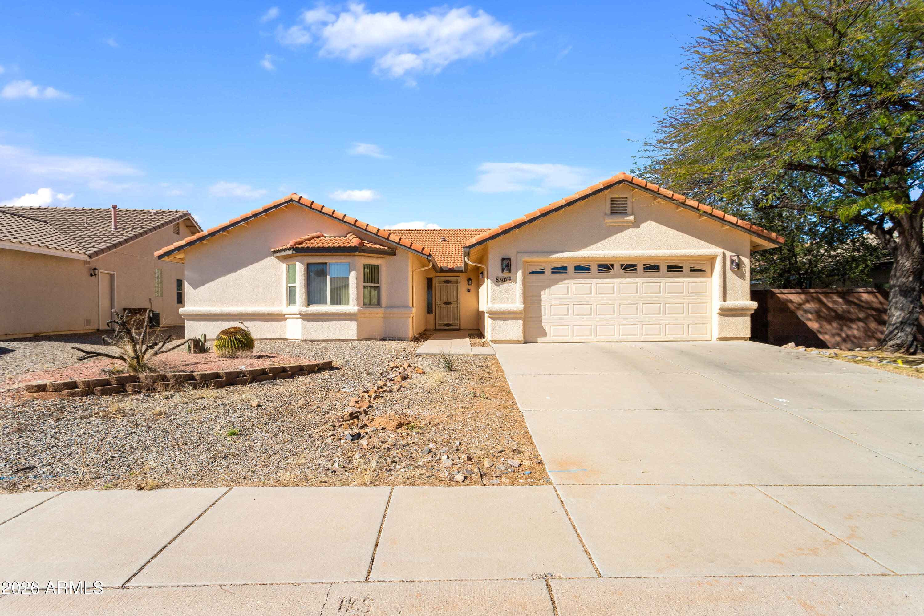 Located in Mesa Verde Estates, this 3 bedroom, 2 bath home offers comfortable living in a quiet neighborhood close to shopping and everyday conveniences. Inside you'll find tile flooring throughout, vaulted ceilings, and a spacious living room with a cozy gas fireplace. The split floorplan adds extra privacy, and the large primary suite features a generous closet. The kitchen stands out with beautiful cabinets and plenty of space to cook and gather. Step outside to the large covered patio, perfect for relaxing or enjoying time with friends and family.