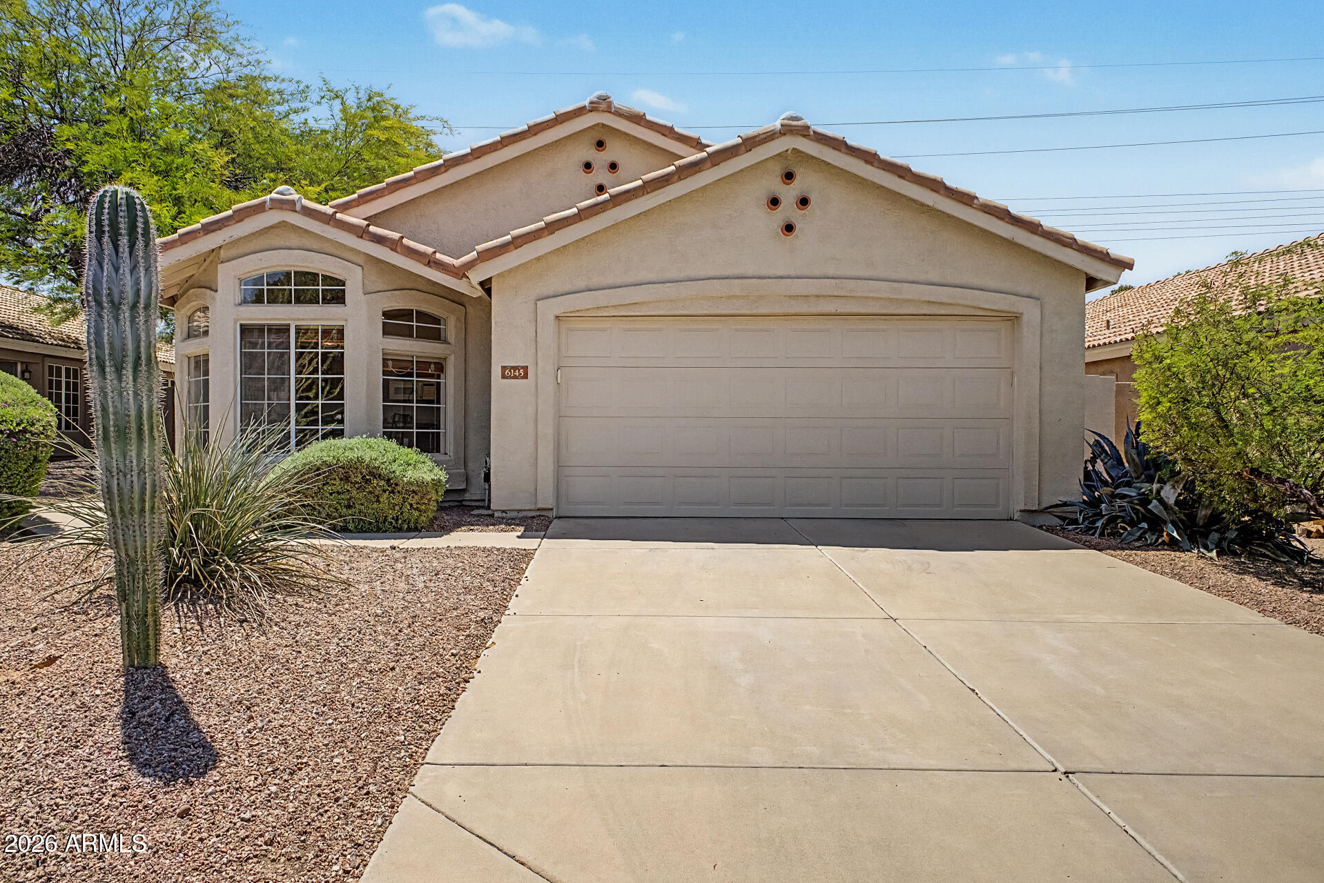 Nestled in a peaceful, amenity-rich community, this inviting 3B, 2BA home offers comfort, style, and effortless living. Bright, airy interiors feature vaulted ceilings, abundant natural light, warm wood flooring, and elegant two-tone paint. The well-appointed kitchen includes a pantry and generous storage, perfect for everyday living and entertaining. Enjoy meals in the formal dining area or the charming eat-in kitchen. Step outside and experience resort-style community amenities including scenic walking and biking paths, clubhouse, tennis courts, and a sparkling pool and spa, all set against the lush backdrop of a nearby golf course. A perfect blend of modern comfort and tranquil lifestyle living! 20 minutes from PHX international airport. Less than 5 minutes from the 202 freeway.