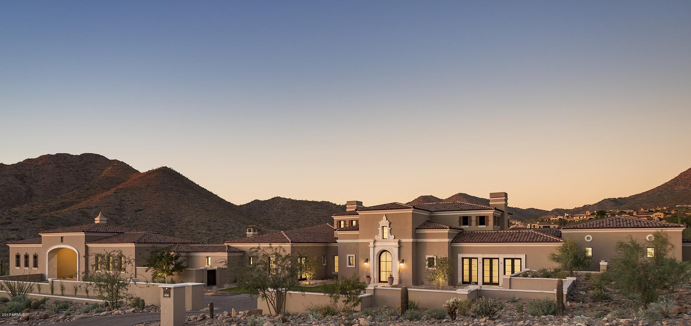 Immediately upon entering the Upper Canyon of the prestigious Silverleaf community, one can’t help but notice this grand Formal Mediterranean estate. Just completed and sitting proudly on 3.84 acres, this 7,520 square foot home offers features so important to buyers in today’s market: single story with no interior steps, city and mountain views, new, quality construction, expansive outdoor living spaces and transitional design style. Touring this home, one can’t help but appreciate the expansive, open floor plan flowing seamlessly to outdoor spaces. It truly fits the needs of most any buyer and is perfect for entertaining small or large groups or intimate family gatherings.  An exceptional Silverleaf home! AMAZING VALUE IN THE UPPER CANYON - SILVERLEAF