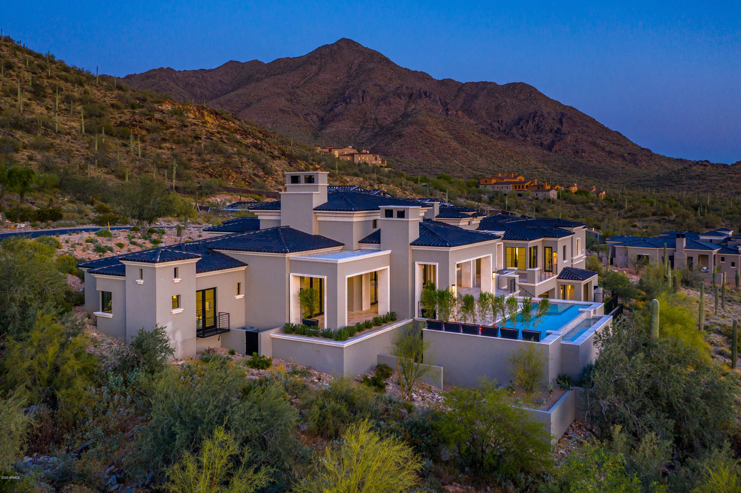 New construction in Silverleaf! Perched high up in the prestigious Upper Canyon neighborhood, this 7698 sf custom home offers some of the most breathtaking views in the Valley. This elegant Formal Mediterranean design has dramatic curb appeal and allows for views from nearly every room. Smart floorplan features key spaces on main level--master bdrm, office, 2 guest suites, pool/ BBQ area and 5 car  garage with no steps. Also includes a walk-out lower level guest retreat accessible via elevator with 3 bedrooms, game room and lower lawn with room to expand.  Stylish interiors are light and bright and accentuate the abundant natural lighting.  Luxury  features found throughout, including wide plank wood floors, Wolf Sub-zero appliances, massive wine-wall, custom fireplaces & beamed ceilings. Additional features include 3 separate laundry areas, smart home technology, massive pocket doors in great room, and a private entry guest casita. Outdoor living features a pool, BBQ center and covered patio with fireplace while capturing sweeping panoramas and Arizona sunsets. Carefully constructed by acclaimed builder Sonora West Development and designed by CP Drewett, this home offers the best in Arizona living.  Property is located in one of Arizona's most sought after addresses, and is easy access to area amenities such as The Silverleaf Club, Market  Street restaurants and shops,  Village at DC Ranch Health Club, Kierland Commons/Scottsdale Quarter retail center, and  Loop 101.  Community is renowned for its connected paths, sidewalk and trails while offering access to the McDowell Mountains and the  Gateway Trail system. Simply one of the  best new homes in one of Arizona's top addresses!