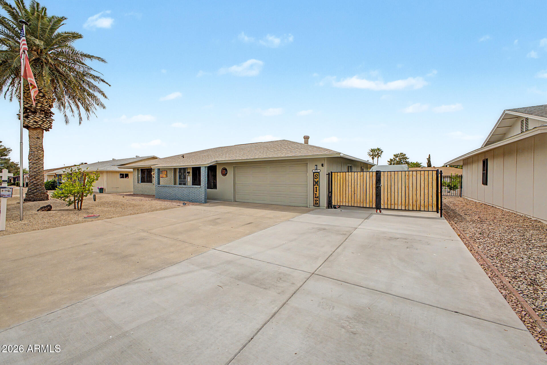 Experience elevated 55+ living in the heart of Sun City! This beautifully maintained single-level home offers 1,710 sqft of comfortable living space on an oversized 9,799 sqft lot. Designed for ease and accessibility with no interior steps, this residence blends functionality with relaxed Arizona living.

The upgraded kitchen features granite countertops and flows seamlessly into spacious living and dining areas--perfect for entertaining or quiet evenings at home. Step into your private screened-in patio, an ideal retreat for enjoying Arizona's beautiful weather year-round. This home also offers rare RV gate and parking, along with a 2-car garage and indoor laundry for added convenience.

Enjoy resort-style amenities including golf courses, heated pools, fitness centers, pickleball, tennis, and a vibrant social scene--all just minutes from your door.

Live the lifestyle you've earned--comfort, convenience, and community all in one.