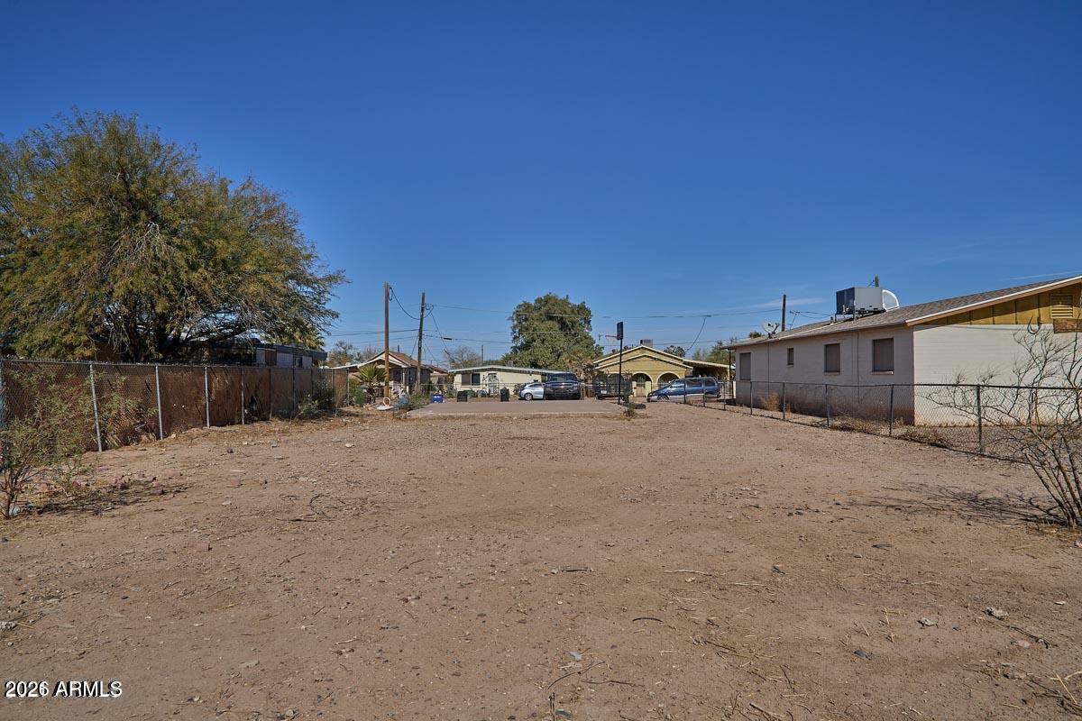 Take advantage of this opportunity to build in the fast-growing City of Eloy. This raw lot is ready to build with water available and is conveniently located near schools, churches, and the library. Five lots offered individually or as a package.