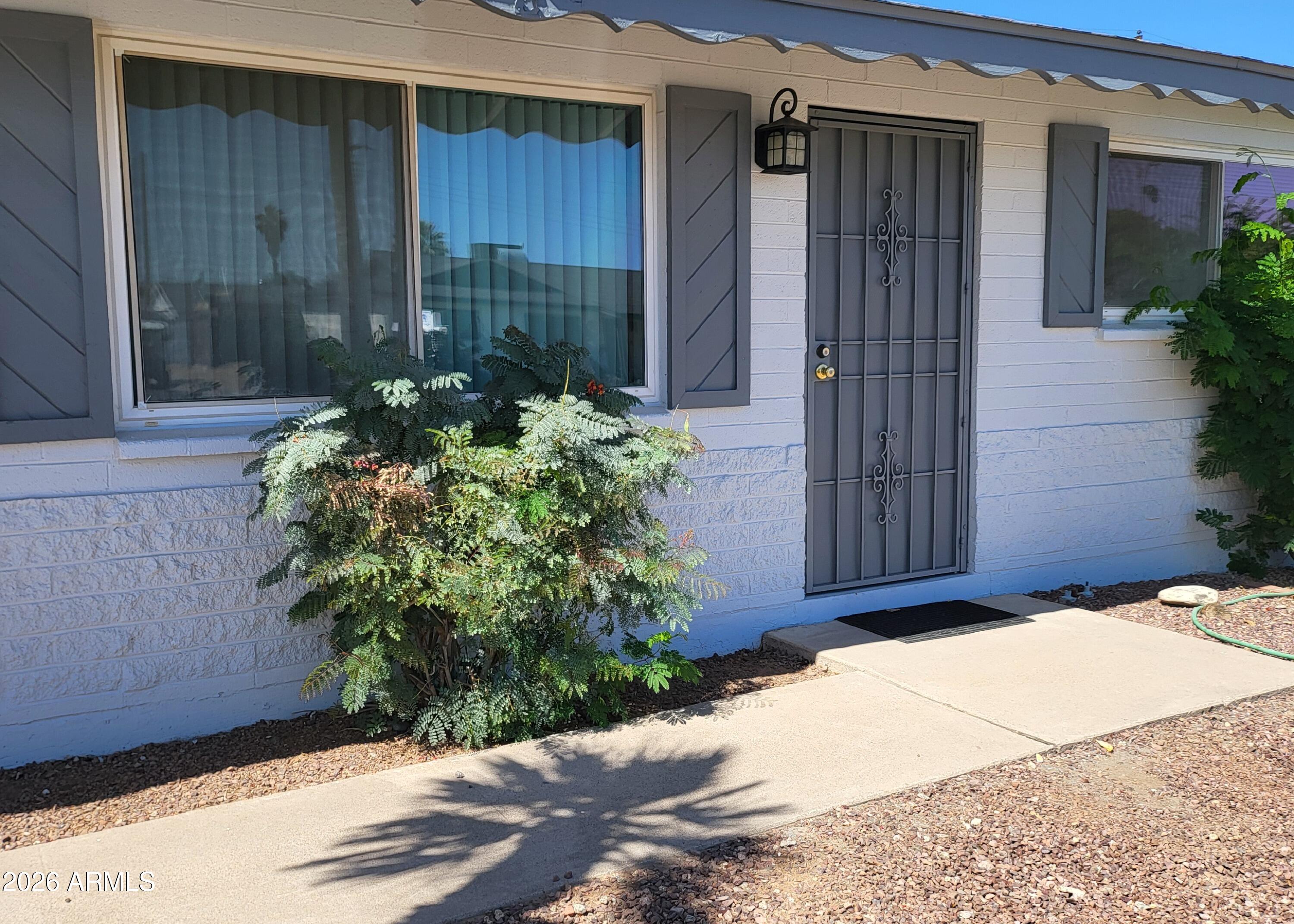 FRESHLY PAINTED inside & out.  This great Home features a Sparkling  Pool, large yard & ...PERFECT LOCATION!!... Near ASU Main Tempe Campus, Old Town Scottsdale & walk to ASU SKYSONG Campus, Just Minutes to the 101 or 202 freeways. This 3 bedroom/2 bath home, also features Living  room, Family Room,     New Electrical panel,   tiled bathrooms  with modern fixtures,  ceiling fans, All  Low ''E'' Duel Pane Windows, Inside laundry room with washer/dryer included and a separate workshop area. This home also has Extended Decking, covered patio & alley access. Tons of curb appeal on a great street. You will love this home!