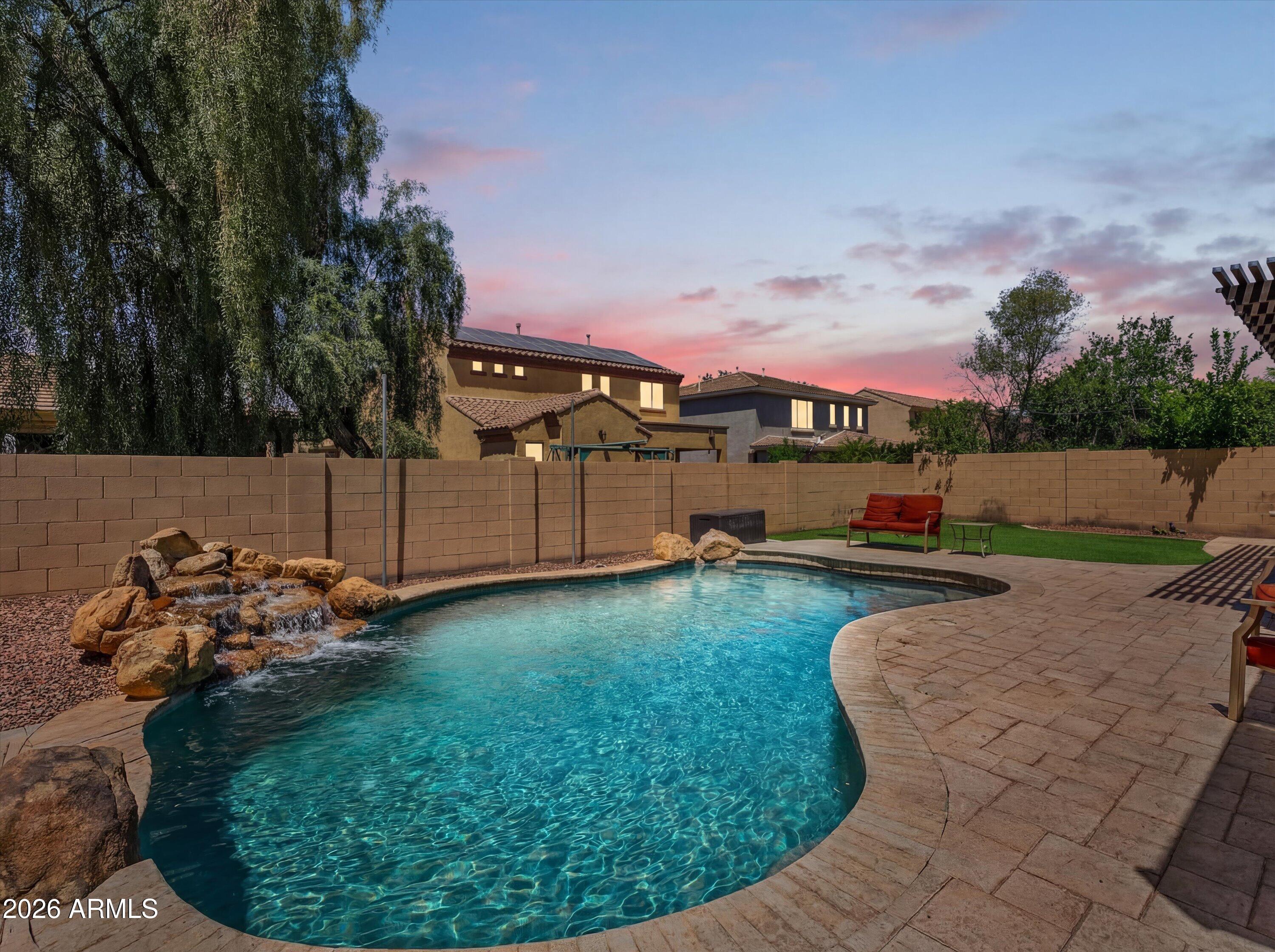 $5,000 SELLER PAID CONCESSIONS! Located in the highly desirable Power Ranch in Gilbert, this beautifully maintained home offers a functional layout with generous living spaces and great natural flow for everyday living and entertaining. The backyard is a true retreat, featuring a private pool, built-in BBQ, fire pit, and an oversized covered patio--perfect for enjoying Arizona evenings year-round. Recent updates include HVAC units just 2 years old, a pool pump replaced in 2021, and fresh exterior paint for added curb appeal and peace of mind. Enjoy all that Power Ranch has to offer, including resort-style community pools, parks, lakes, walking trails, and year-round events, along with a nearby golf course and convenient dining options within the community. Ideally located near top-rated schools, shopping, dining, and easy access to the Loop 202.