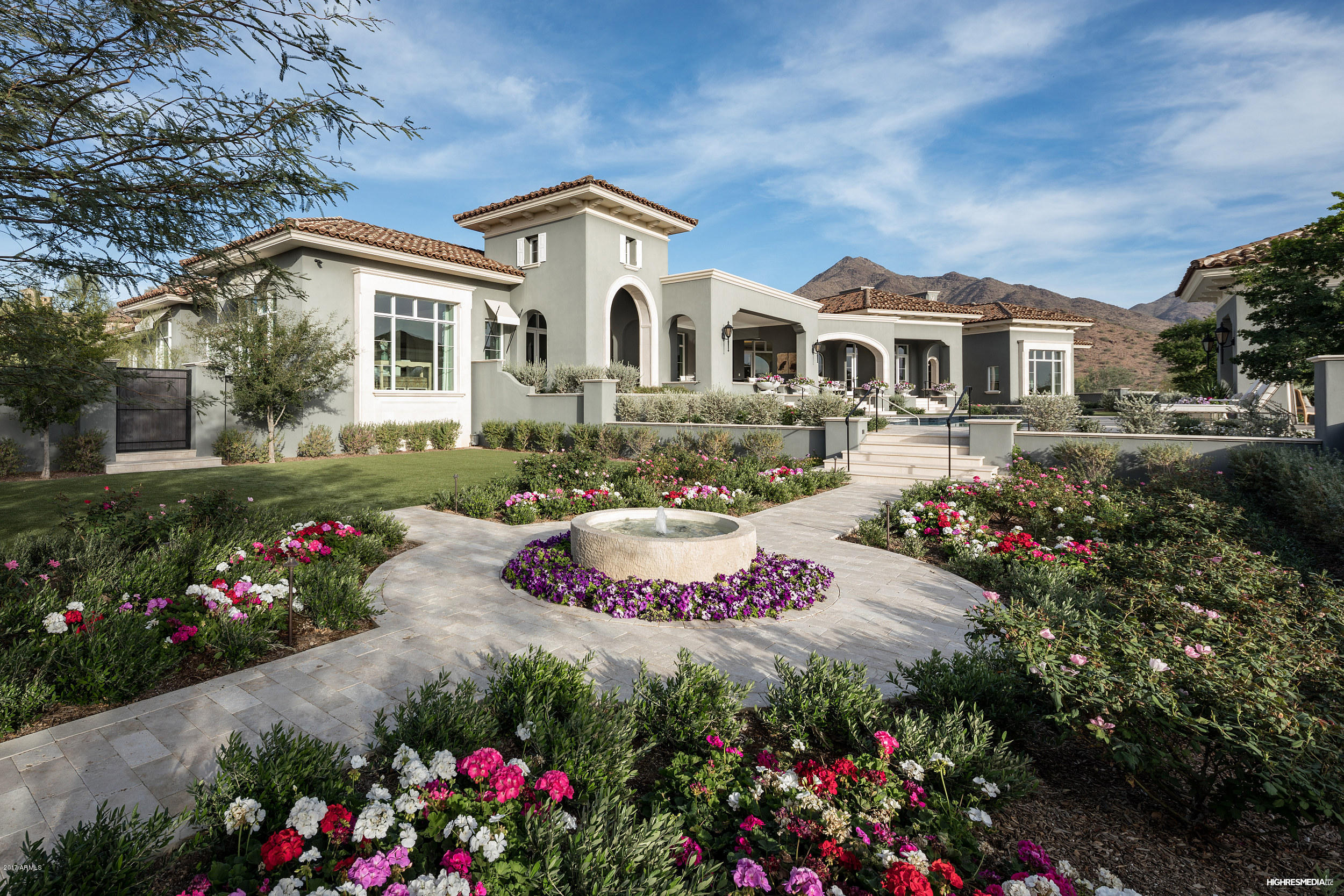 This is as good as it gets - Horseshoe Canyon of Silverleaf, 7000 square feet, single story, southern exposure and views that go on forever from oversized, spectacular windows. This beautiful Formal Mediterranean home sits on 2.15 acres, with spectacular estate grounds, gardens, lovely pool and spa, pool cabana, fireplaces and water features. Built by Salcito Custom Homes, the quality of construction and finishes and certainly the style is superb and the photos speak for themselves. Currently 4 bedrooms in the home, but a detached garage is plummed and designed for a perfect guest home.