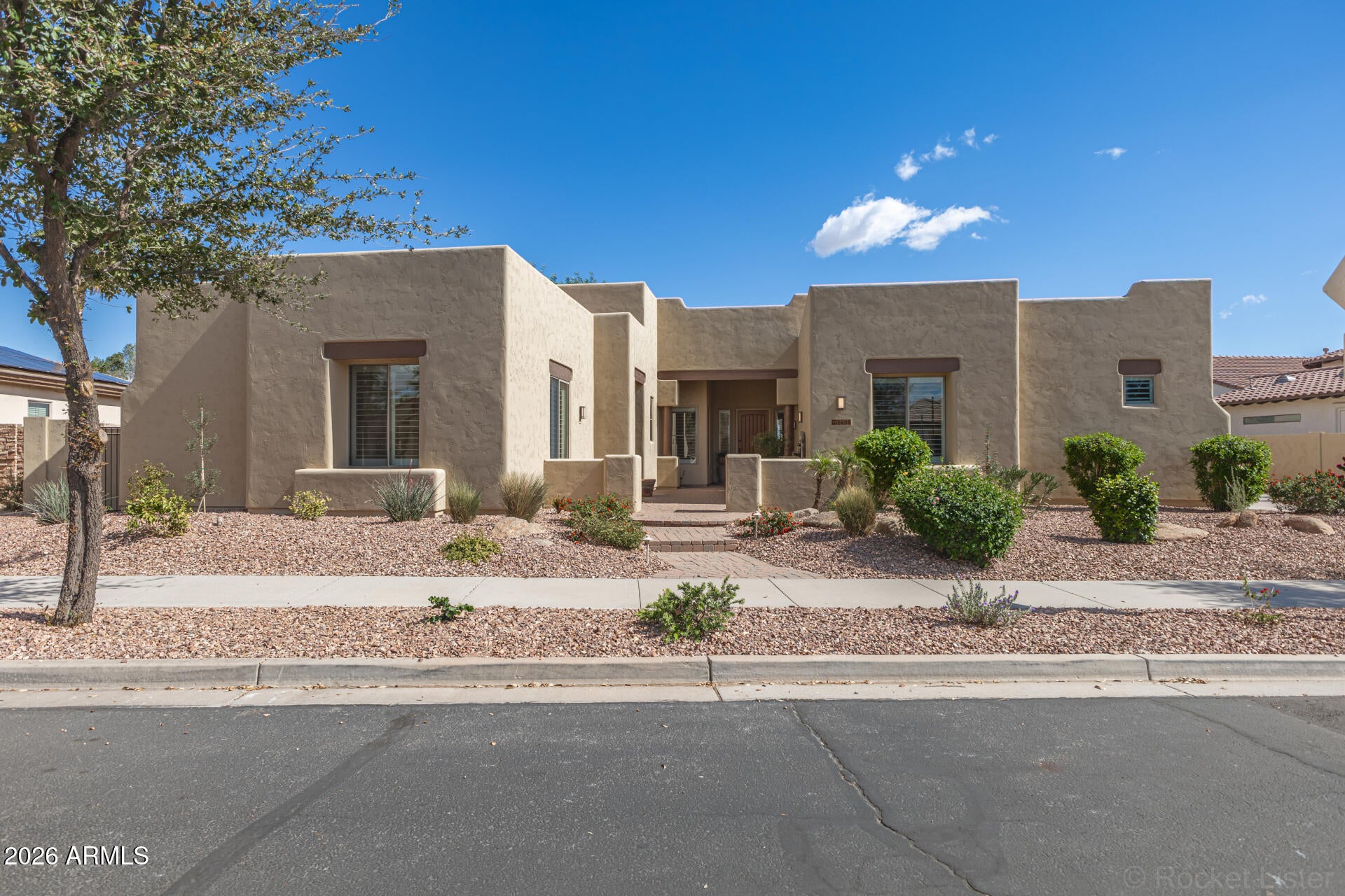 Golf course home in gated Madera!  5 bed/3.5 bath.  5th bedroom has a seperate patio entrance and garage access.  270 degree views of lake and mountains.  Pool with cave grotto, fire pit and built in grill.  6.3 KW owned solar system.  3.5 car side entry garage w/extended depth. 12' and 10'' ceilings.  Lots of natural light, plantation shutters, recessed lights, and tile flooring. Spacious great room layout features a wet bar with wine storage.  The kitchen has stainless steel appliances- Thermador ovens and 36'' cooktop,  36'' range hood, a 48'' GE Monogram built in fridge, two Bosch dishwashers and walk-in pantry.  Hickory cabinets and stone vanities/tub/shower surrounds throughout home.  Main bath has 3 shower heads and dual-sided walk-in closet with washer and dryer hook-up.