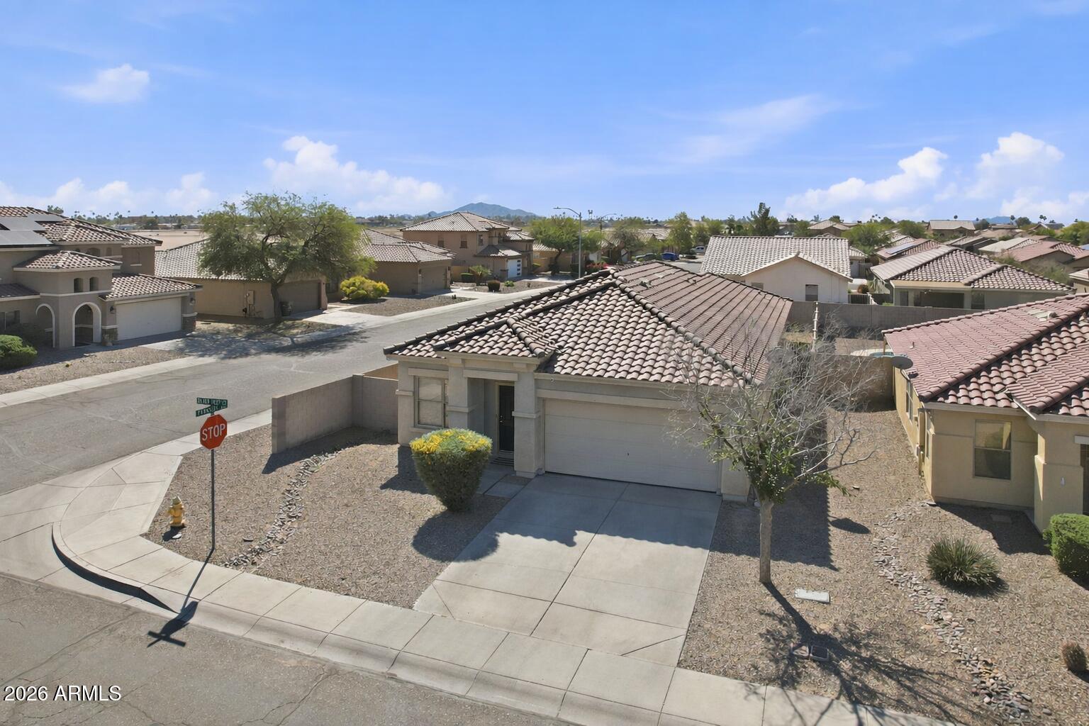 Opportunity in Desert Crossing! This spacious 1,921 sq ft home offers 3 bedrooms, 2 baths, plus a versatile den perfect for a home office, playroom, or flex space. The open floor plan features 9-ft ceilings and a bright kitchen with center island overlooking the main living area--ideal for entertaining and everyday living. Situated on a desirable corner lot in a quiet cul-de-sac with a greenbelt park at the end of the street featuring a basketball court and walking trails, providing added privacy and open space. Conveniently located near shopping, dining, and daily amenities. Motivated seller--bring your offers!