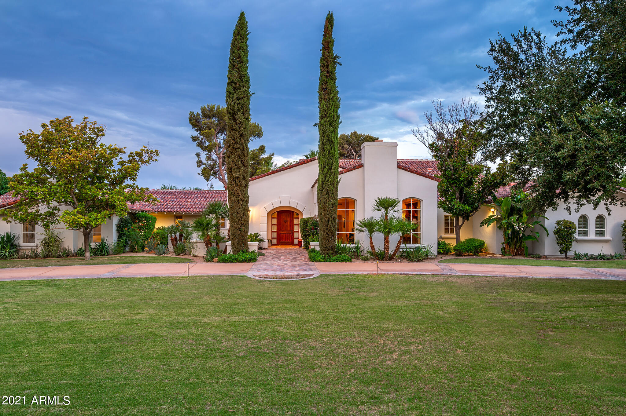 A beautiful classic Santa Barbara home located on a prime interior lot in Casa Blanca Estates. This home boasts stunning traditional finishes with 7,372 sq.ft. 6 bedrooms,  5.5 baths on a 34967 sq.ft. lot. A gourmet kitchen w/Egyptian limestone floors, Viking range, furniture style cabinetry, a huge center island, and fireplace creates the heart of the home. The inviting living room w/beamed 12ft. ceiings and large scale fireplace opens out to a wonderful entertaining patio.   5 bedrooms in the main home 4-bedroom/ w a split upstairs guest room/bath and a detached 1-bedroom guest house.  You will find an outdoor paradise landscaped by Greg Trutza (The Royal Palms) w numerous patios for entertaining, putting green, fenced pool and botanical garden to complete this fantastic home.