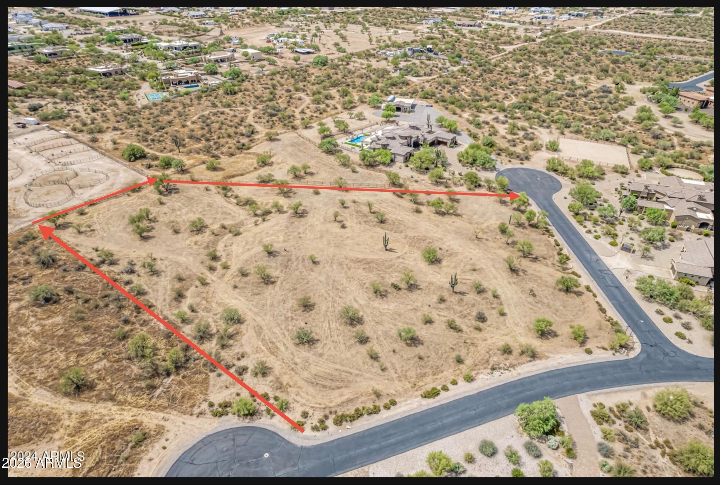 Build your dream estate on this premier 3.36-acre cul-de-sac lot in the gated luxury community of Granite Mountain Ranch. Surrounded by multi-million dollar homes, this elevated homesite captures sweeping views of Four Peaks, the McDowell Mountains, and Granite Mountain.

Enjoy a generous, flexible building envelope with underground utilities, paved roads, and the rare ability to orient your home toward Estrella Ct or Lowden Ct. Designed for privacy, space, and versatility, this property is ideal for a custom residence, equestrian lifestyle, or private retreat. Community amenities include a 15-acre equestrian facility, riding arenas, and direct access to Tonto National Forest for endless outdoor recreation.