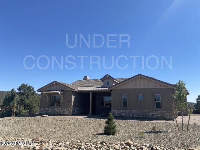 Newly completed home in Whispering Canyon with mountain views on over .5 acre. This new build offers great room open concept design featuring a gas fireplace, with adjoining dining area, coffered ceiling, sliding door access to the covered patio, open kitchen w/ shaker white cabinets, upgraded Bosch appliances w/ gas cooktop and built in oven, granite counters, walk in pantry and open concept butler's pantry upgrade. Natural hue laminate flooring with 10' + ceilings add architectural interest. Split floor plan w/ 3 bedrooms & open flex room perfect for an office or den. Primary ensuite w/ walk in closet, bathroom featuring walk in shower, dual sinks, & linen closet. Paver patios and driveway. Front landscaping is included.